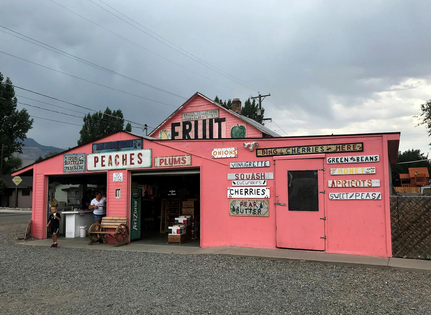 A fruit stand is painted the color of the fruit on offer, peaches, in Palisade, Colo. Photo by Lisa Meyers McClintick, special to the Star Tribune