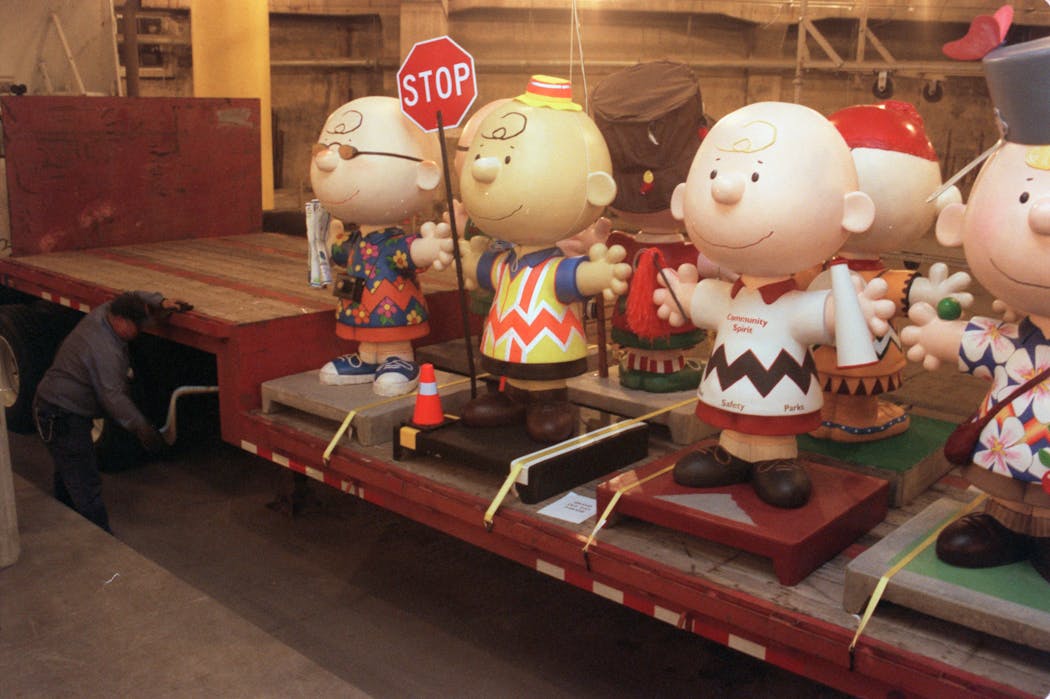 Charlie Brown statues awaited shipment on a flatbed truck at Rivercenter in 2001.