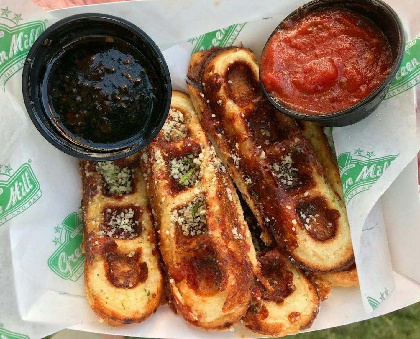 Za-Waffle Sticks, Green Mill, Cooper/Randall, $5. Hard to hate, but the love doesn't exactly come through, either. Not sure if breadstick-ey savory waffles are the way to go, and the pepperoni-infused "maple" syrup is icky. Not sure the marinara is a better bet. Photo by Rick Nelson New food at the Minnesota State Fair 2018