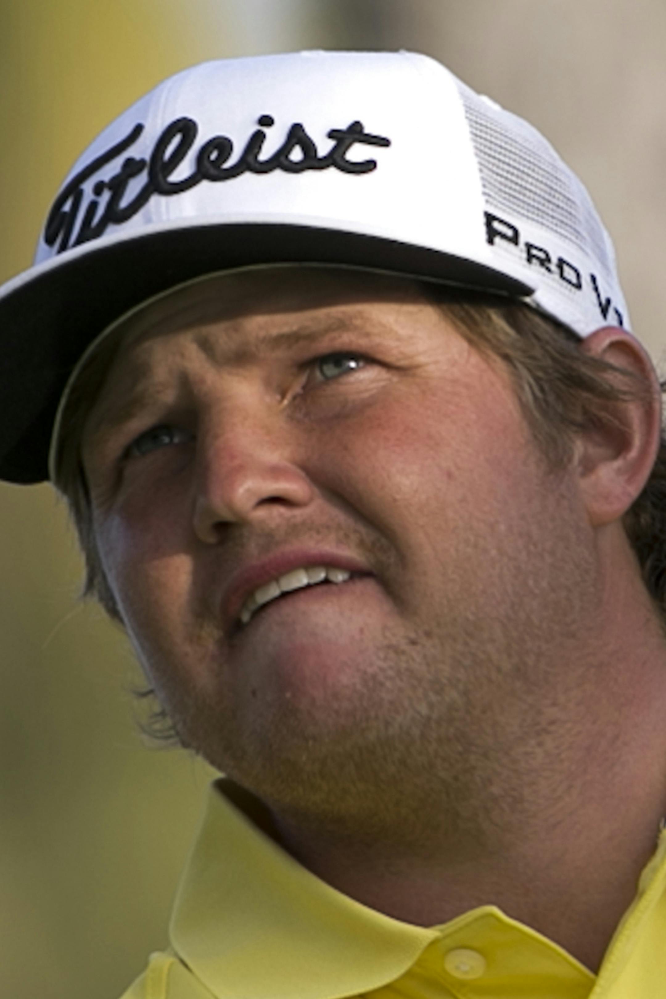 Zac Blair follows his drive on the 18th tee box during the second round of the Sony Open golf tournament, Friday, Jan. 15, 2016, in Honolulu. (AP Photo/Marco Garcia)