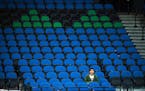 With the exception of one fan, an entire lower-level section was empty during the fourth quarter during a Wolves-Memphis game at Target Center in Octo
