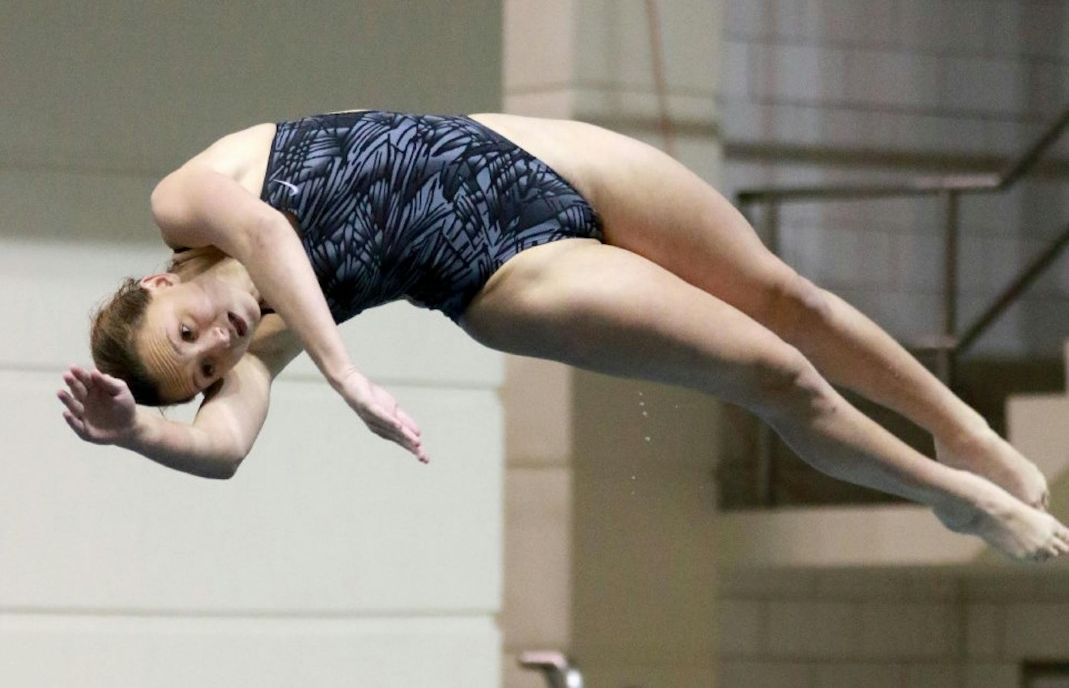 Edina freshman Megan Phillip won the one-meter diving competition at the Class 2A girls' swimming and diving state Friday, at the University of Minnesota Aquatic Center in Minneapolis. She credited her ability to focus and block out the distraction of having to defeat a reigning champion.