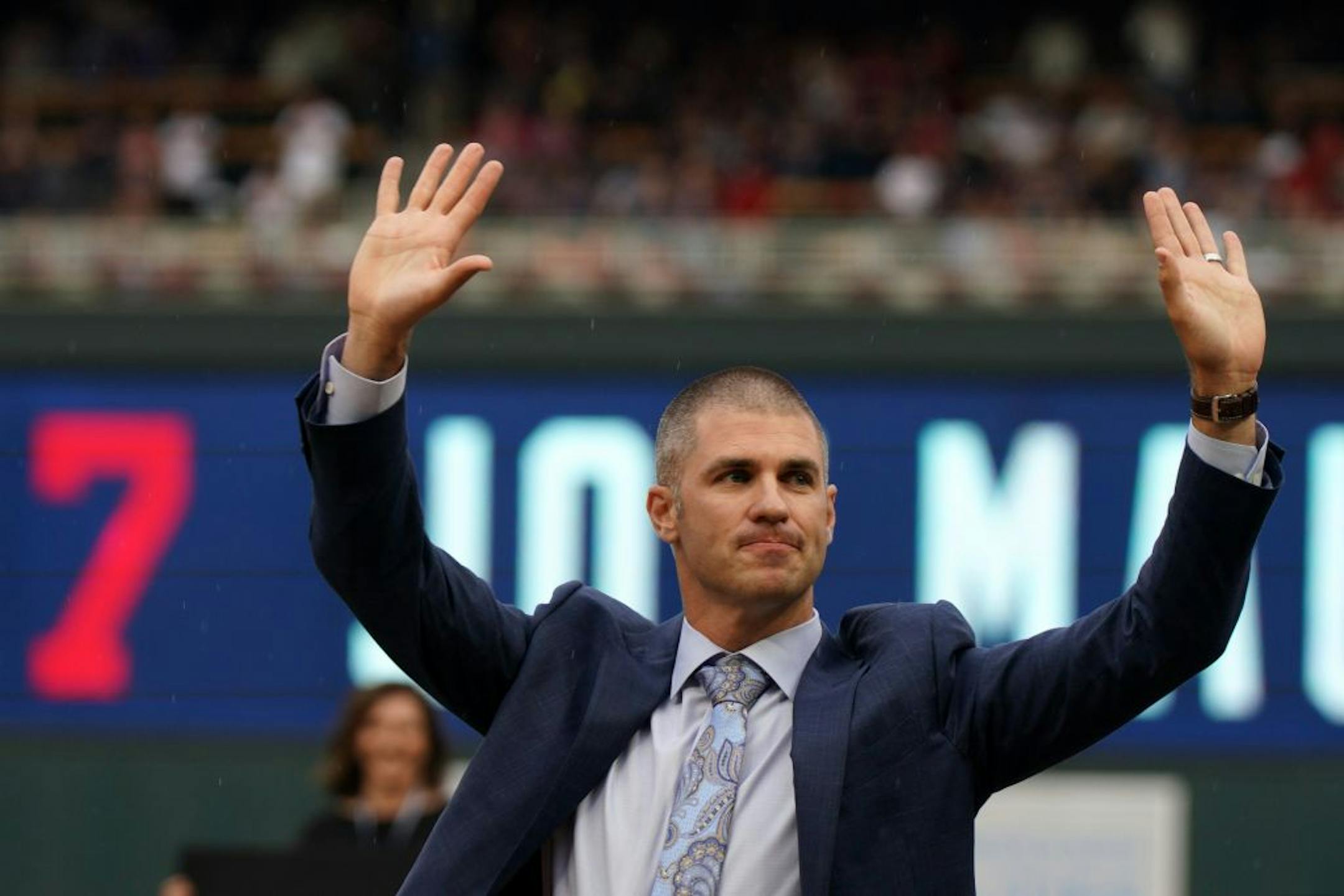Former Twins great Joe Mauer acknowledged his fans during a pregame ceremony to retire his number 7 Saturday.