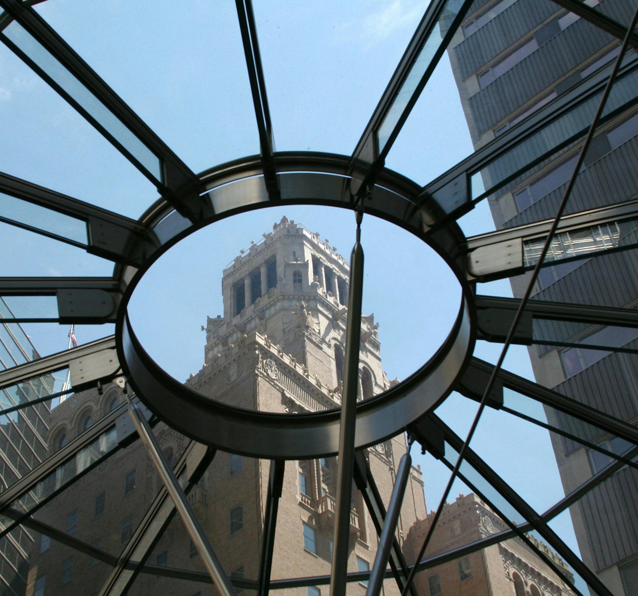 The 81-year-old Plummer Building, one of the oldest on the vast Mayo campus, peaks through a skylight in the clinic's more modern cafeteria.