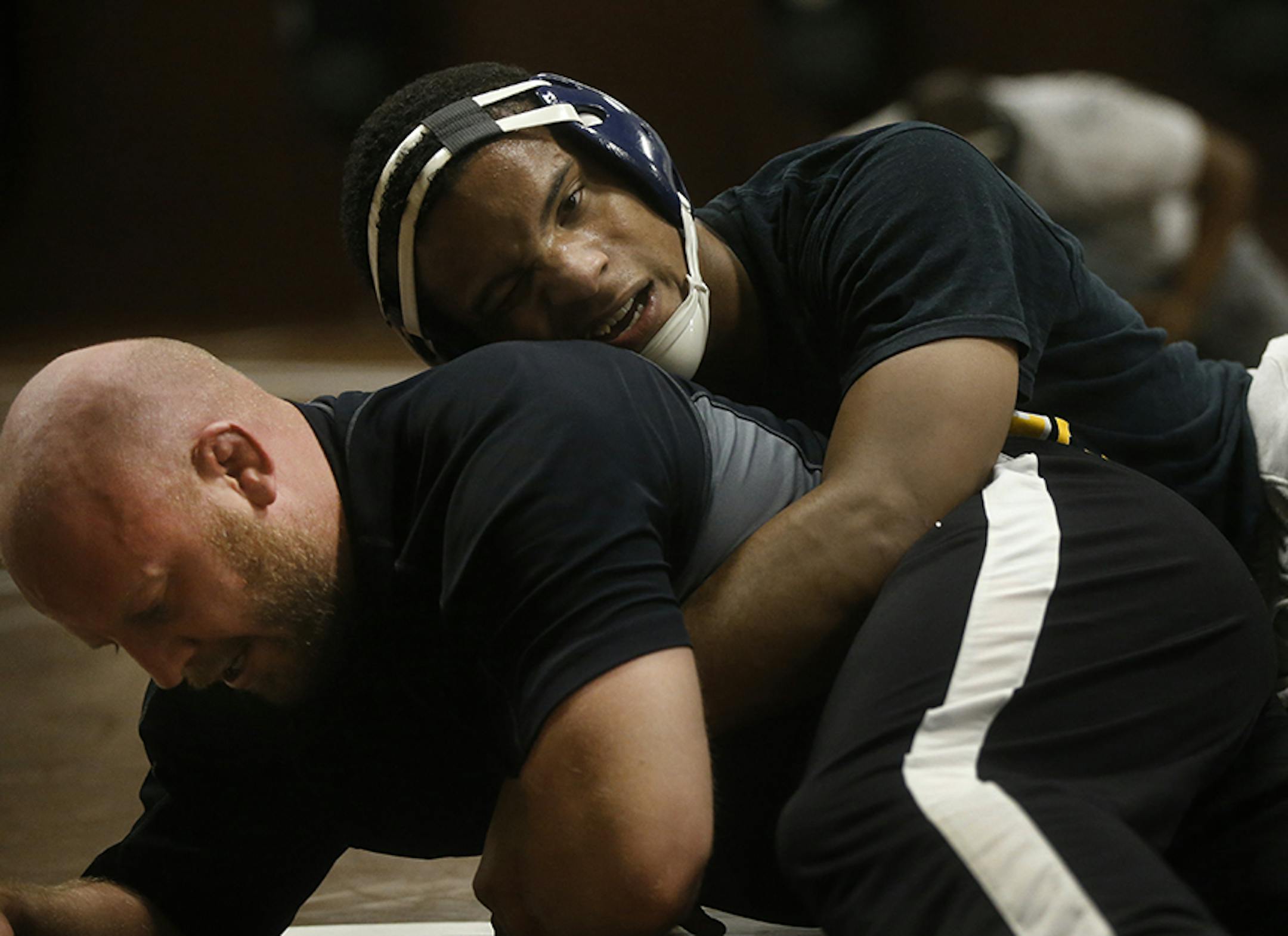 Apple Valley's Mark Hall is considered, pound-for-pound, the best high school wrestler in the nation. The junior wrestles at the 170 lbs. weight class. He is wrestling assistant coach Jake Avre.] Richard Tsong-Taatarii/rtsong-taatarii@startribune.com