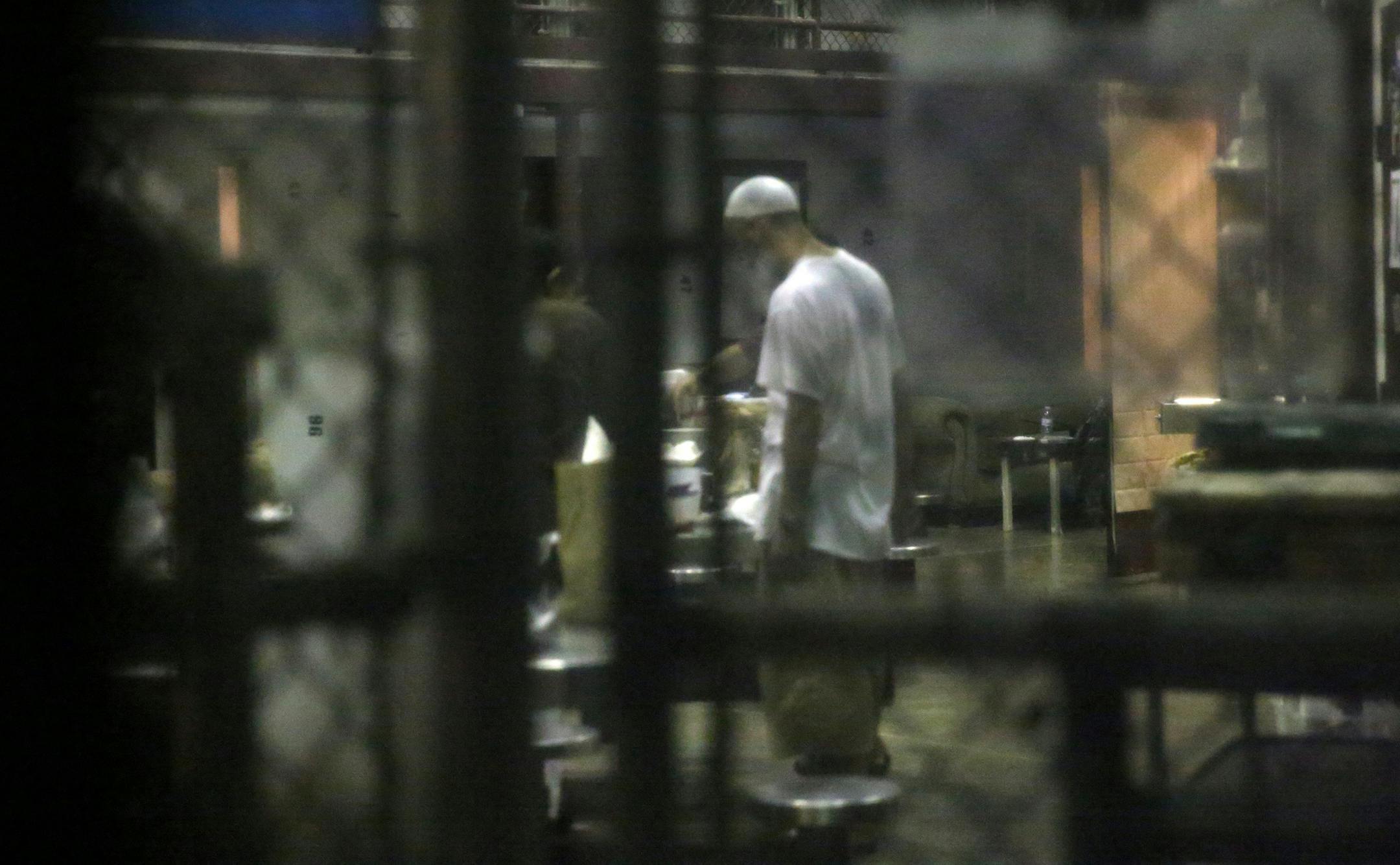 A detainee stands in the common area of the cell block on February 11, 2017, at Camp Six at Guantanamo's Detention Center Zone. The military approved release of this photo. (Emily Michot/Miami Herald/TNS) ORG XMIT: 1200419