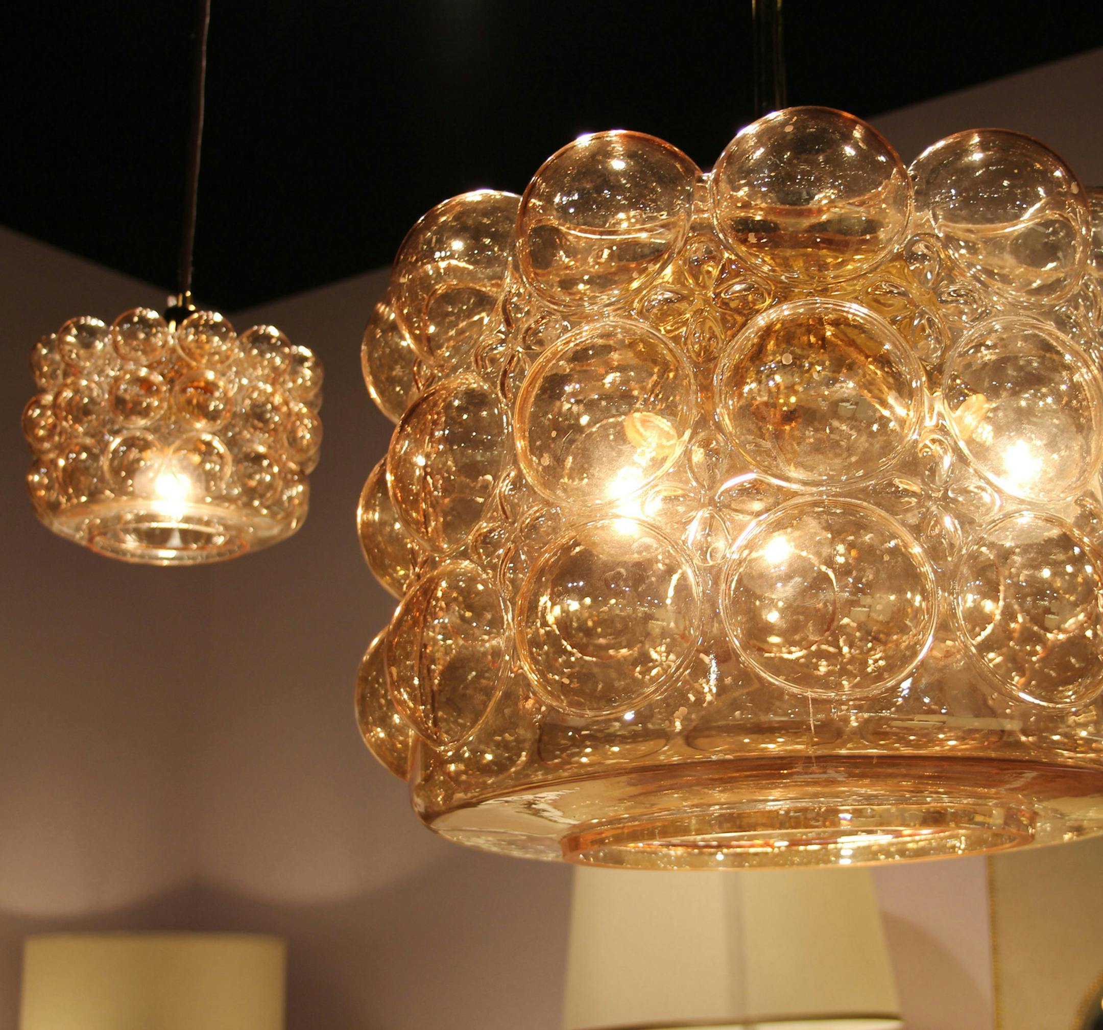 Jamie Young's Cici pendant lamp in gold carnival glass. It comes in clear and other colors and is available in two sizes. (Patricia Sheridan/Pittsburgh Post-Gazette/TNS)