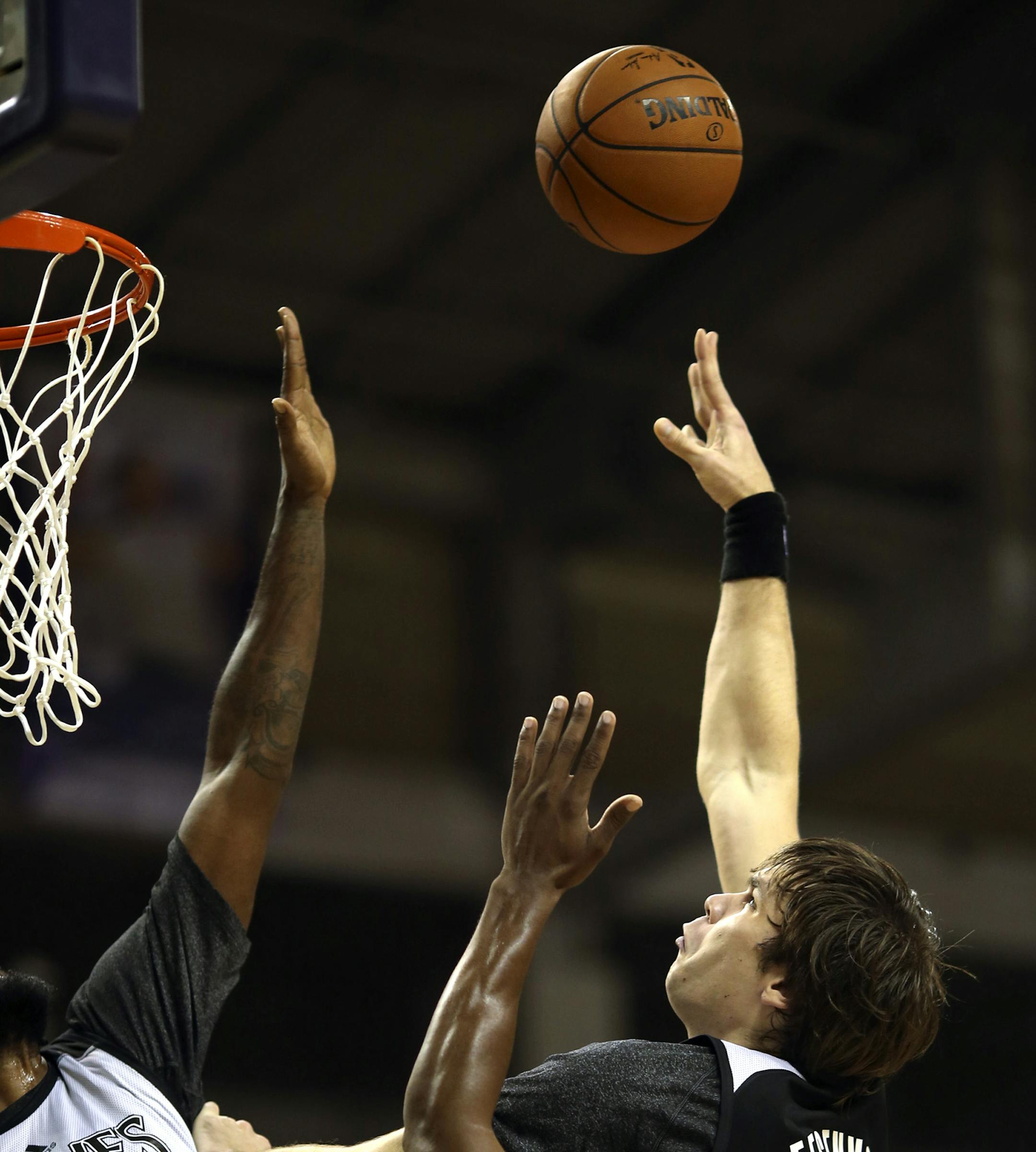 Kyrylo Fesenko took a shot during one of the scrimmages during the Dunks After Dark event early Tuesday morning at Bresnan Arena in Taylor Center in Mankato. ] JEFF WHEELER ‚Ä¢ jeff.wheeler@startribune.com The Minnesota Timberwolves kicked off their training camp with their first Dunks After Dark event beginning at Midnight Monday night, September 29, 2014at Bresnan Arena in Taylor Center on the campus of Minnesota State University, Mankato. ORG XMIT: MIN1410021740332337
