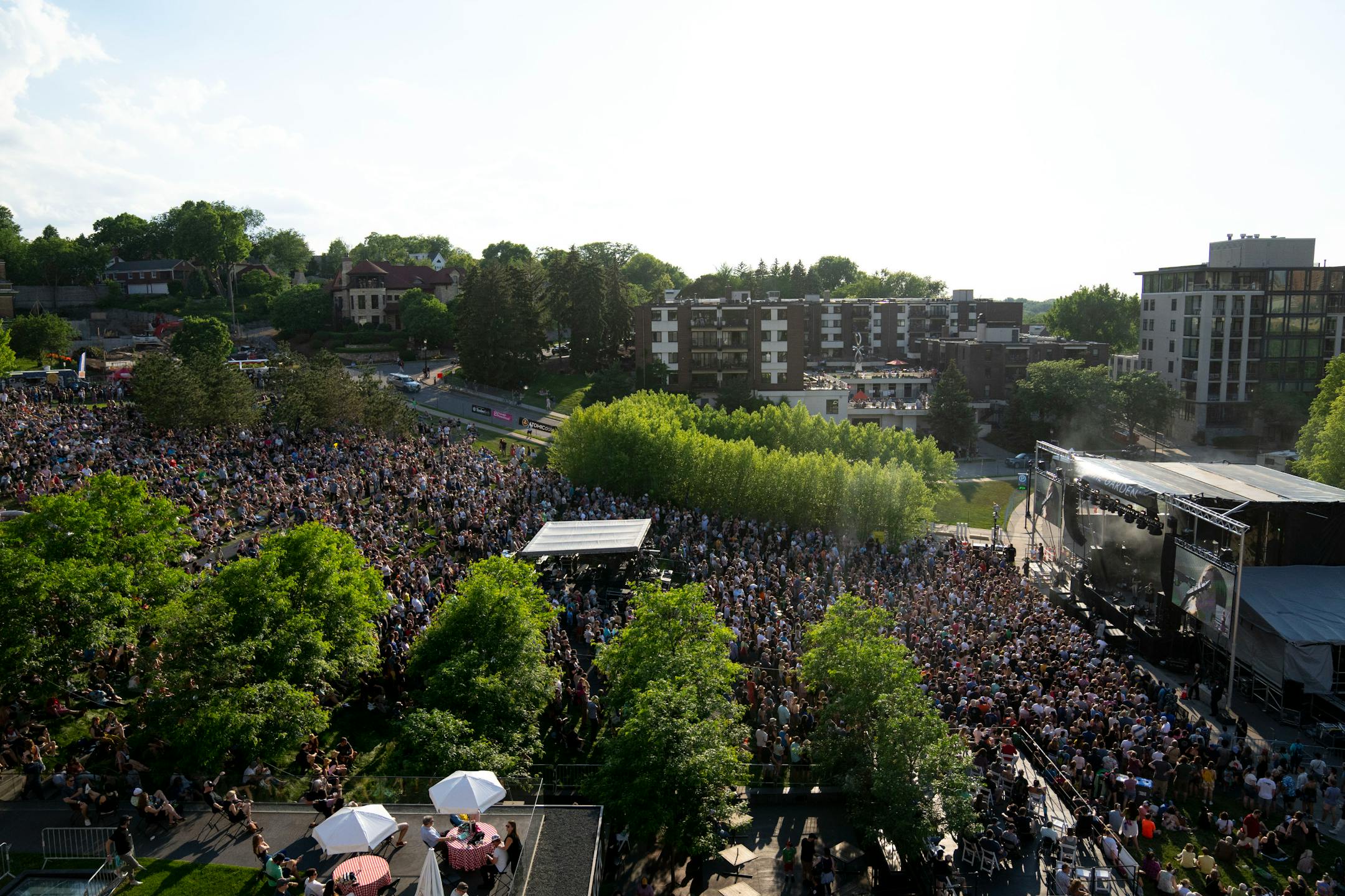 Thousands of people listen as Sleater-Kinney performs during Rock the Garden.