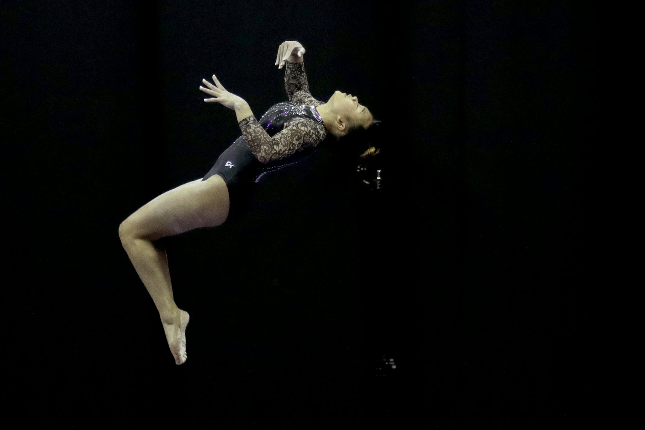 Sunisa Lee competes on the beam during the senior women's competition at the 2019 U.S. Gymnastics Championships Sunday, Aug. 11, 2019, in Kansas City, Mo. Lee finished second in the all-around. (AP Photo/Charlie Riedel)