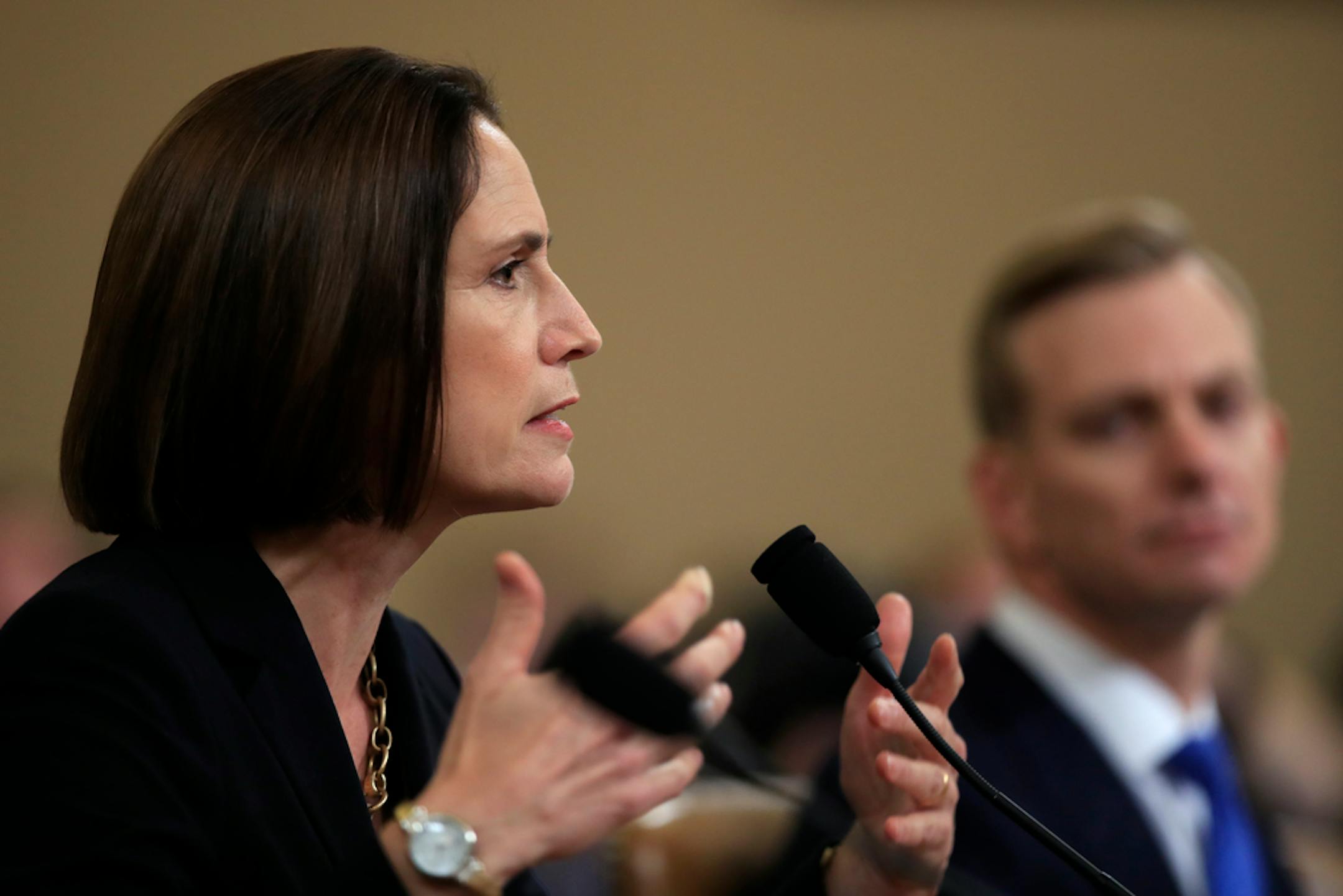 Former White House national security aide Fiona Hill, and David Holmes, a U.S. diplomat in Ukraine, right, testify before the House Intelligence Committee on Capitol Hill in Washington, Thursday, Nov. 21, 2019, during a public impeachment hearing of President Donald Trump's efforts to tie U.S. aid for Ukraine to investigations of his political opponents. (AP Photo/Manuel Balce Ceneta)