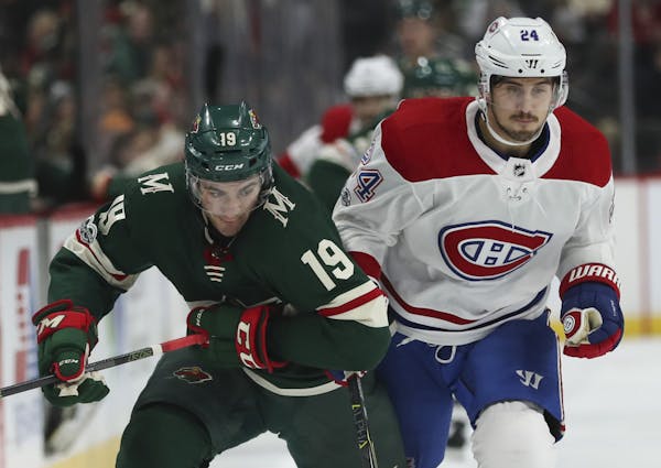 Center Luke Kunin, left, played in 19 games with the Wild before a season-ending knee injury.