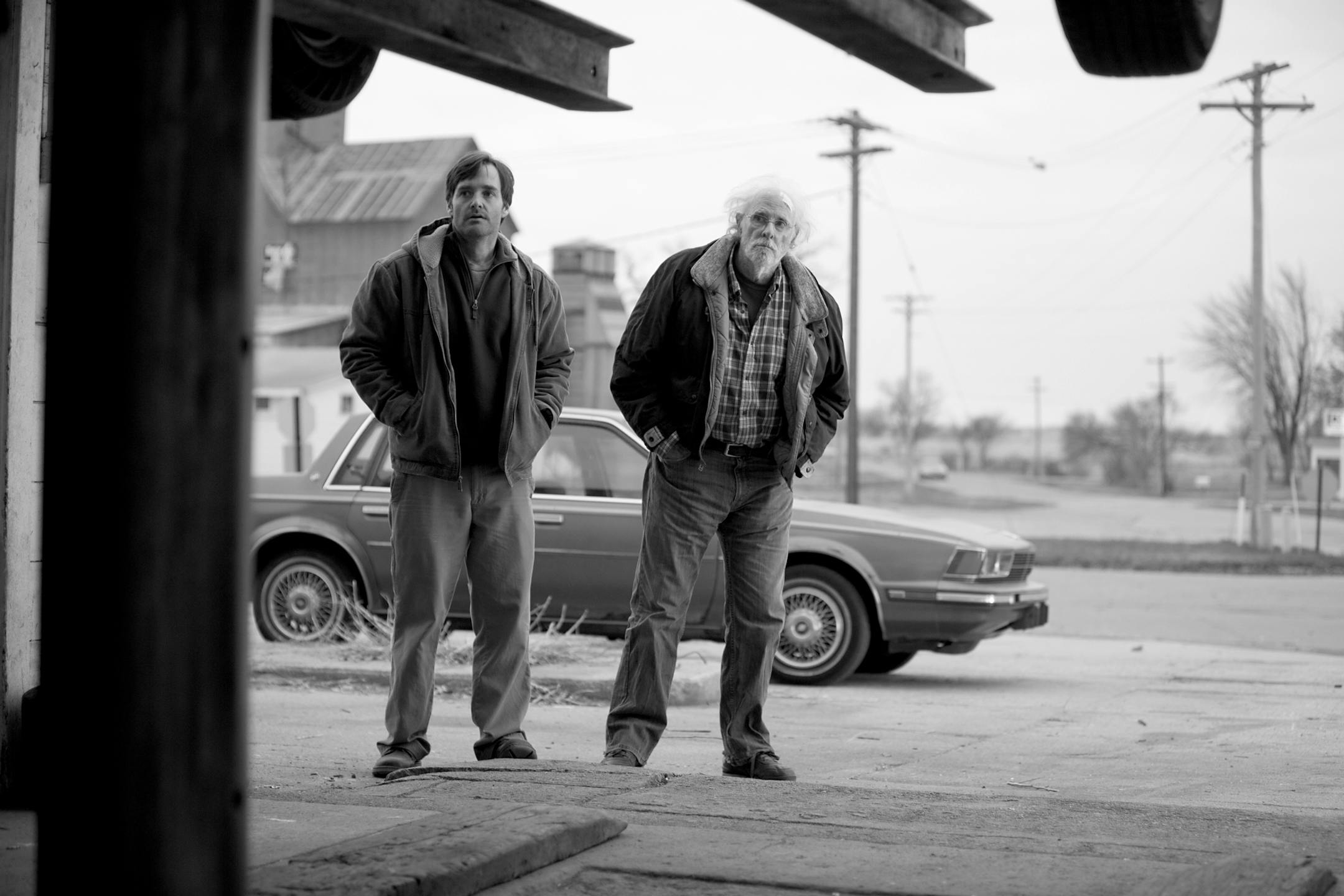 This image released by Paramount Pictures shows Will Forte as David Grant, left, and Bruce Dern as Woody Grant in a scene from the film "Nebraska," about a booze-addled father who makes to Nebraska with his estranged son in order to claim a million dollar Mega Sweepstakes Marketing prize. The film was nominated for a Spirit Award for best feature on Tuesday, Nov. 26, 2013. The Spirit Awards will take place Saturday, March 1, 2014. (AP Photo/Paramount Pictures, Merie W. Wallace)