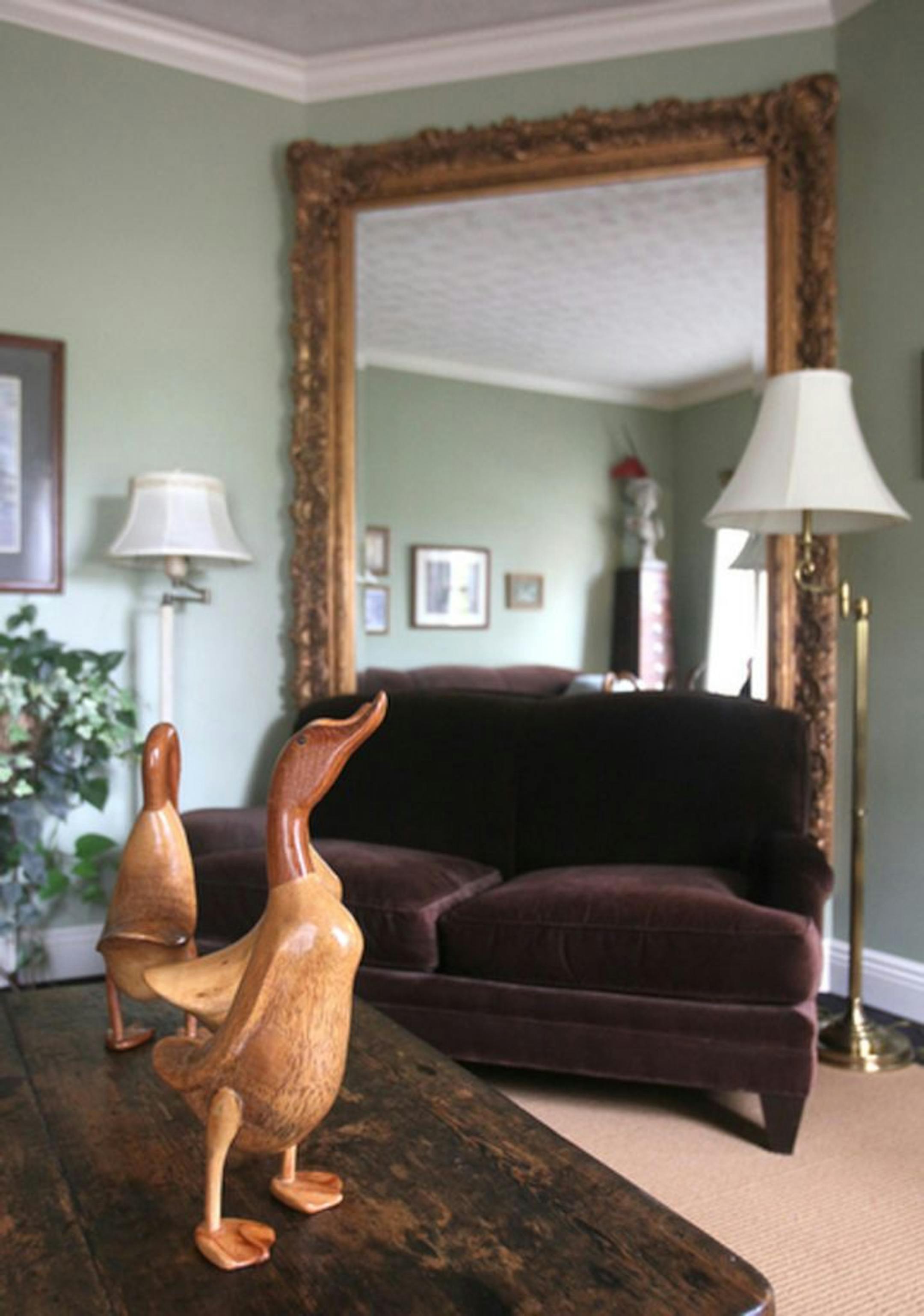 Large mirrors and artwork are one way Sharon Kreighbaum uses to help decluttering in her new book "Is Your House Overweight?"