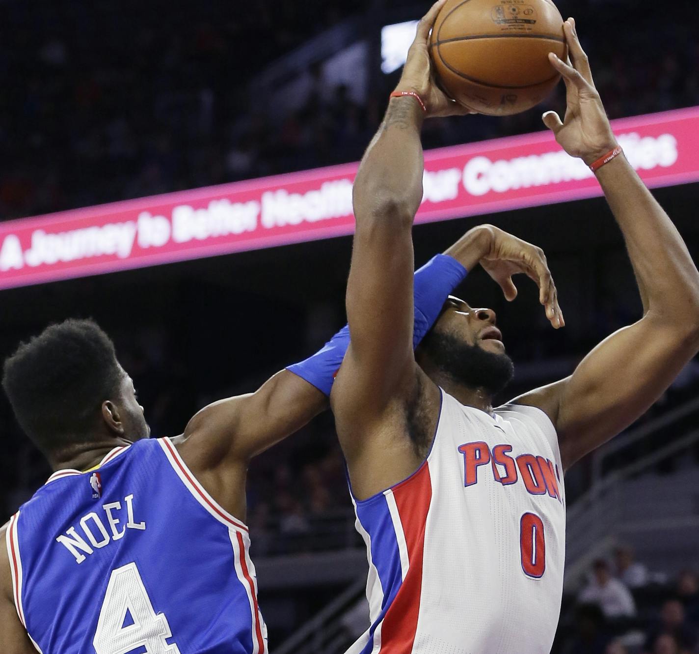 Detroit Pistons center Andre Drummond (0) is fouled by Philadelphia 76ers forward Nerlens Noel during the first half of an NBA basketball game, Wednesday, Jan. 27, 2016 in Auburn Hills, Mich. (AP Photo/Carlos Osorio) ORG XMIT: otkco101