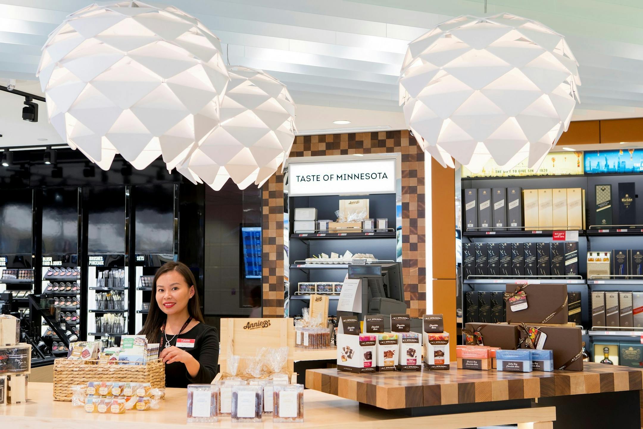 Tenzing Taythi works at a duty-free shop at Minneapolis-St. Paul International Airport.