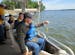 (From left to right) Bill Kajer, Joe Vaughan and Larry Smith enjoy a ride on the Scott County chapter of Let's Go Fishing with Seniors' pontoon boat J