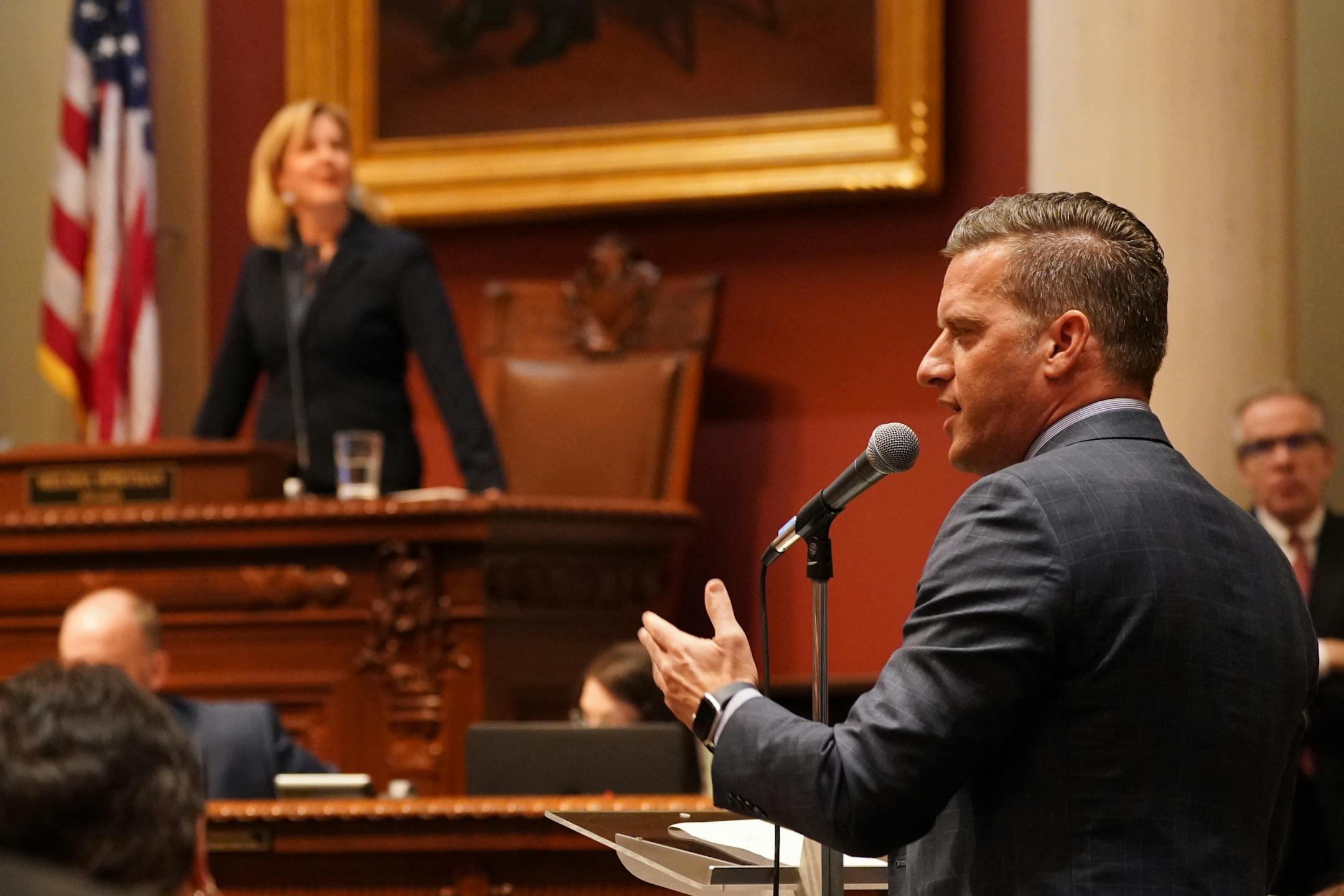 House Speaker Melissa Hortman listened as Minority Leader Kurt Daudt debated Rep. Steve Drazkowski's, R-Mazeppa, motion to immediately adjourn the session, which failed, at the start of the legislative session Tuesday.