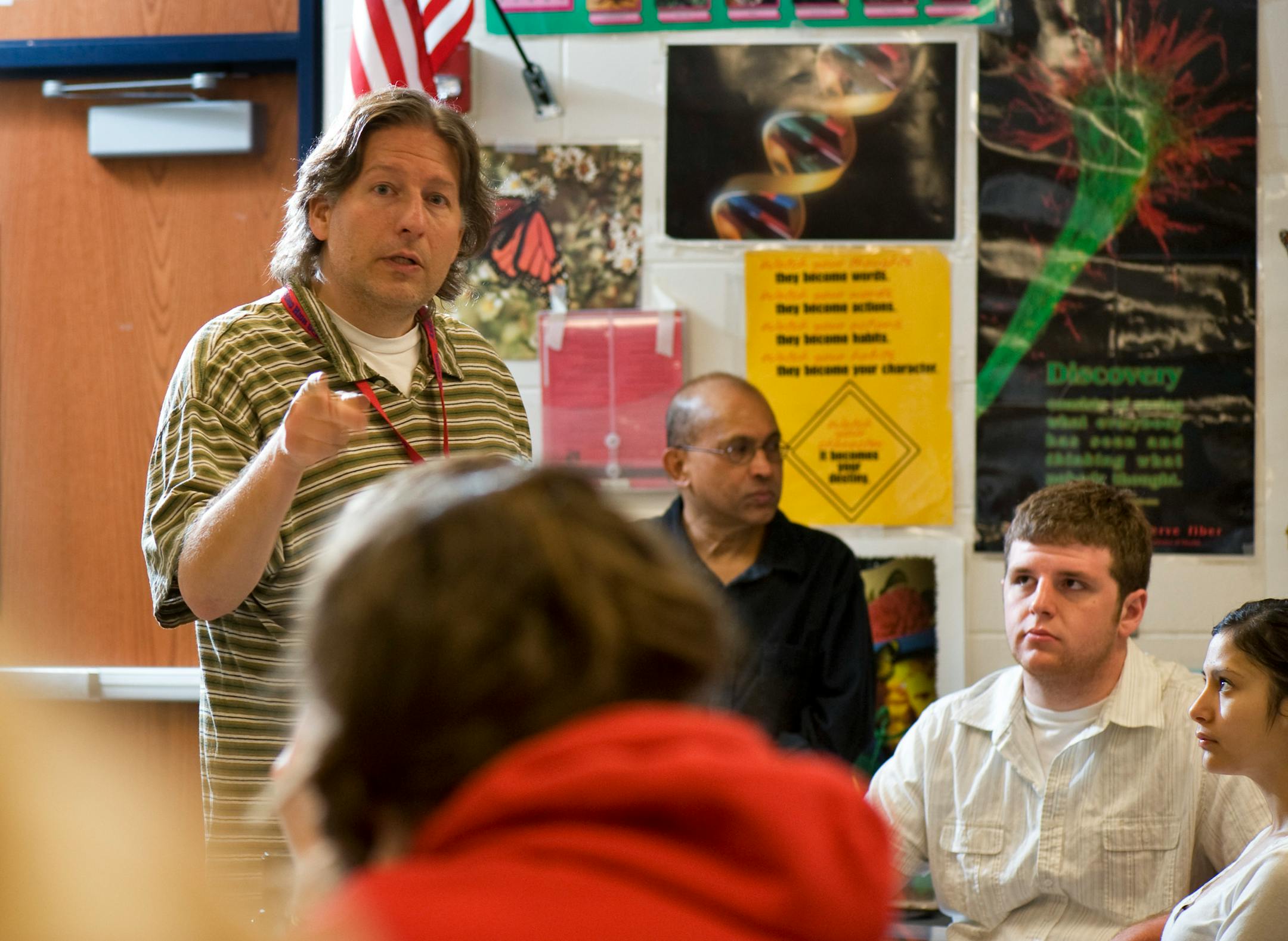 Teacher John Redelsheimer prepped his class Wednesday at Robbinsdale Armstrong High School before the lights were dimmed and monitors displayed a live video feed of a knee-replacement surgery.