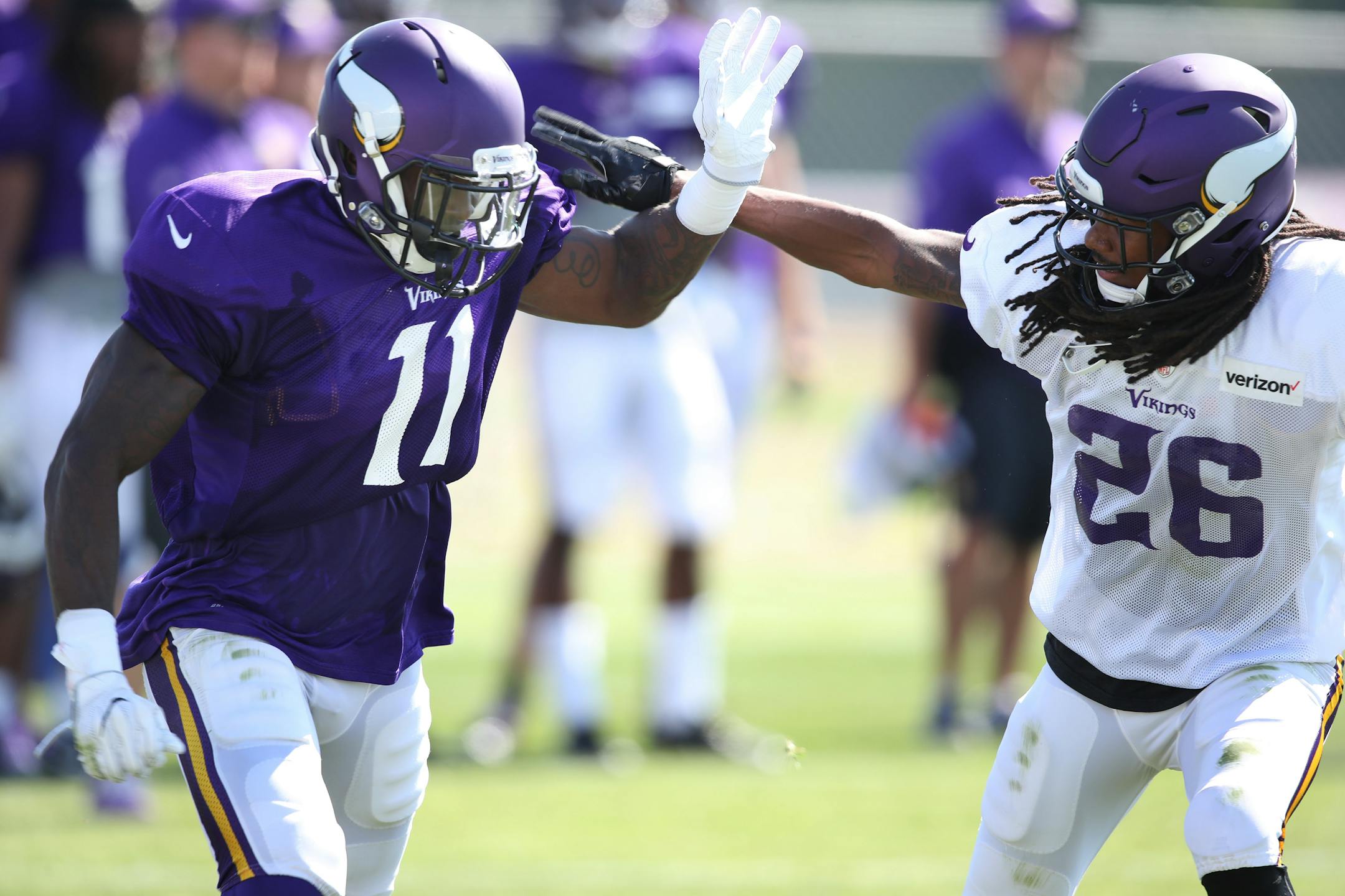 Vikings receiver Laquon Treadwell (11) tried to break free from cornerback Trae Waynes at Minnesota State University, Mankato during training camp.