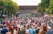 Thousands of people moved down Liggett Street on Aug. 24, the first day of the 2023 Minnesota State Fair in Falcon Heights.