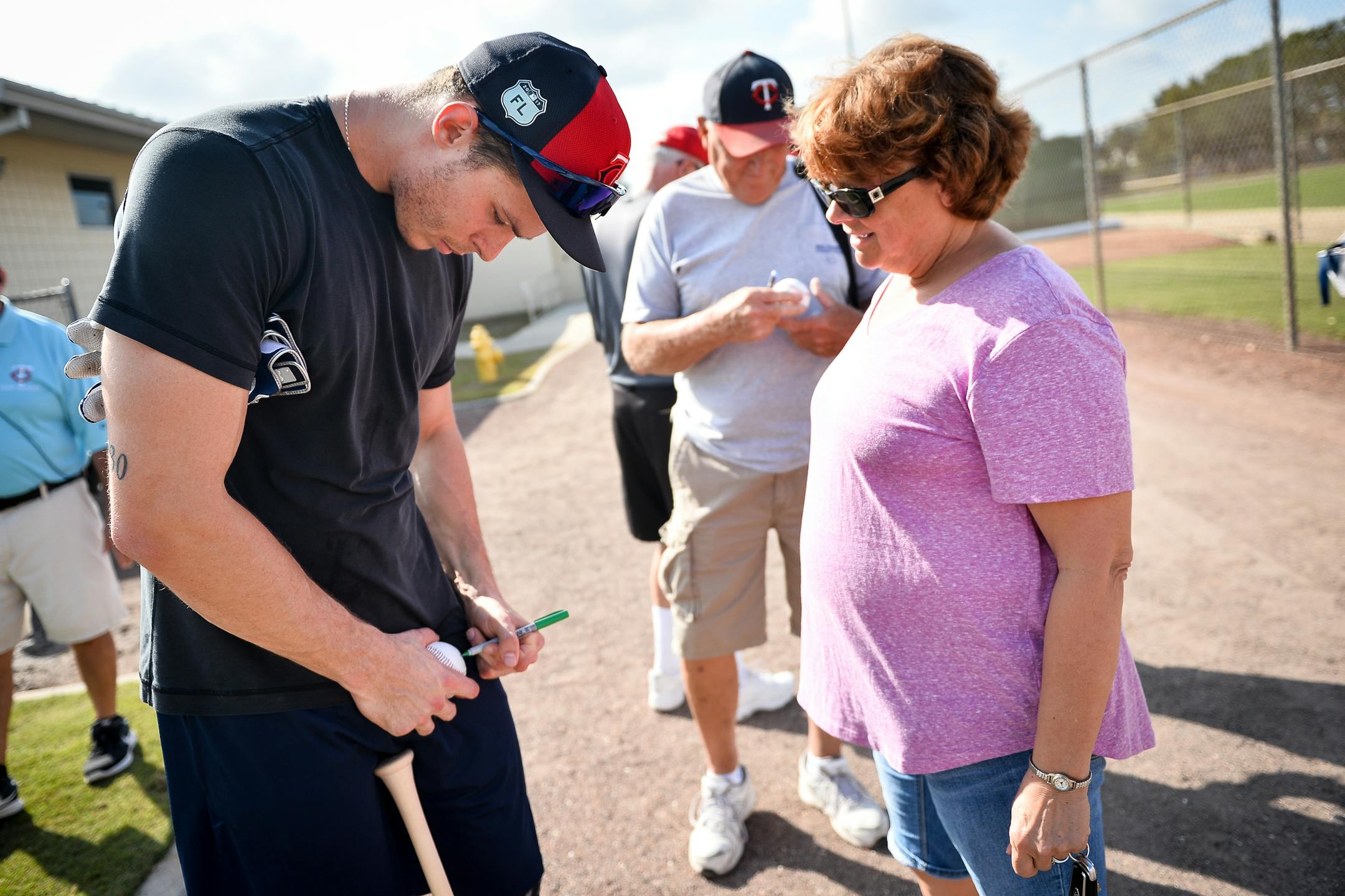 Twins outfielder Max Kepler signed a ball for Pam Finley, of Finland, Minn., as Kepler made his way to an optional workout Monday. ] AARON LAVINSKY � aaron.lavinsky@startribune.com Minnesota Twins players took part in optional workouts on Monday, Feb. 13, 2017 at CenturyLink Sports Complex in Fort Myers, Fla.
