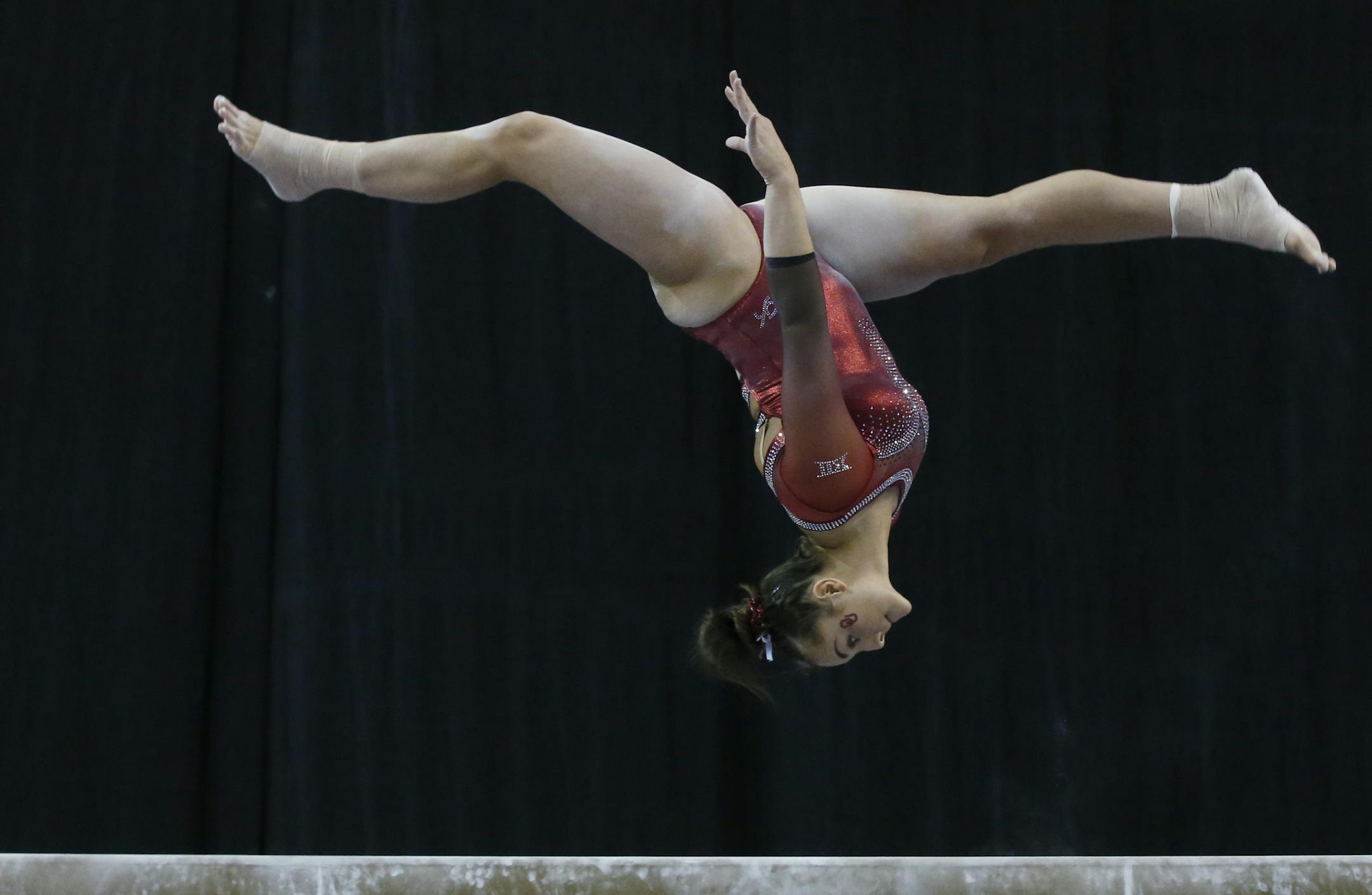Oklahoma gymnast Maggie Nichols competes in the Perfect Ten Challenge at the Bart and Nadia Experience in Oklahoma City, Saturday, Feb. 16, 2019. (AP Photo/Sue Ogrocki) ORG XMIT: OKSO ORG XMIT: MIN1904171542309618
