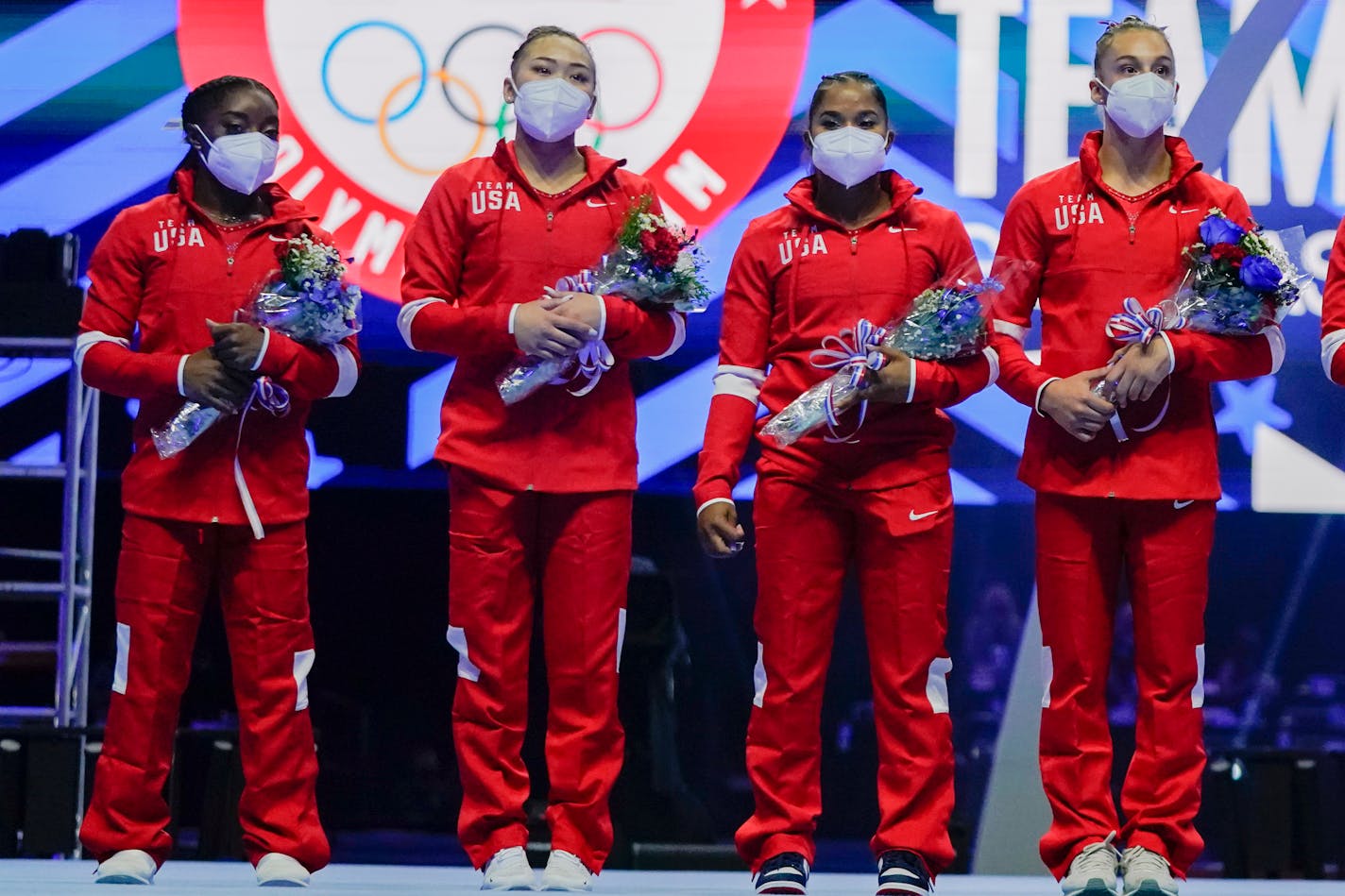 Members of the U.S. Women's Olympic Gymnastic Team, Simone Biles, Suni Lee, Jordan Chiles and Grace McCallum (L-R) are announced after the U.S. Olympic Gymnastics Trials Sunday, June 27, 2021, in St. Louis. (AP Photo/Jeff Roberson)