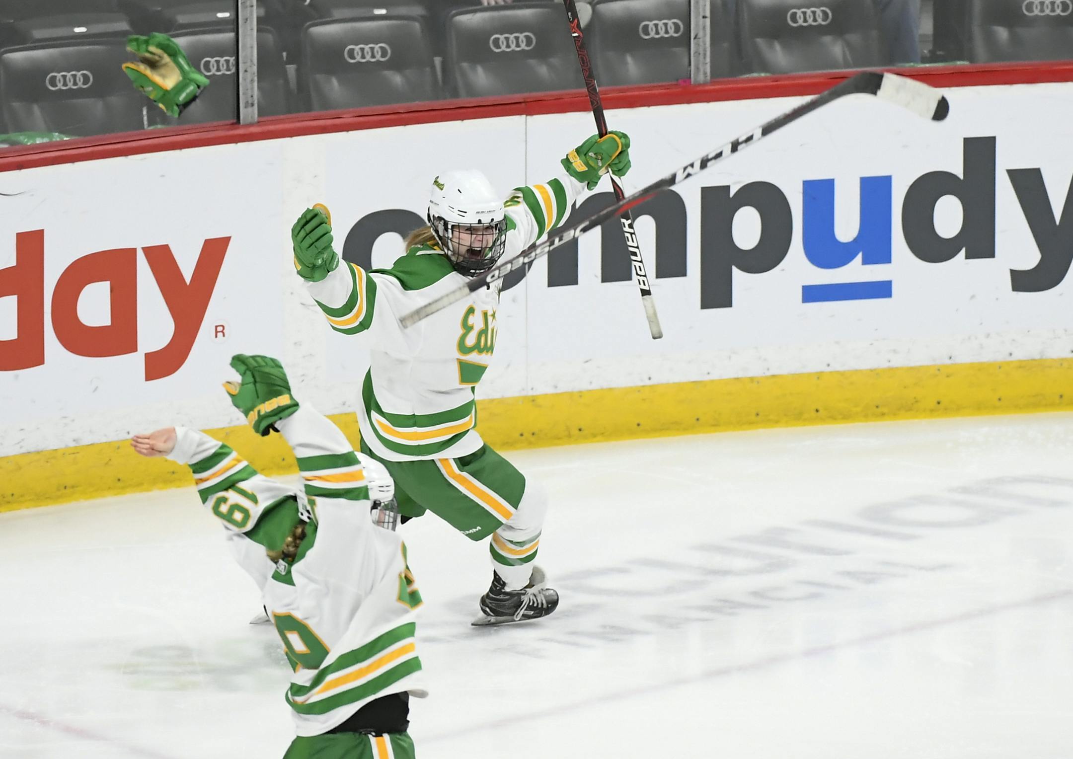 Edina forward Tella Jungels (19) and forward Olivia Swaim (4) celebrated their 2A championship victory over Brainerd / Little Falls after Swaim's goal in 2OT. ] Aaron Lavinsky ¥ aaron.lavinsky@startribune.com Edina played Brainerd/ Little Falls in a Class 2A girls' hockey state tournament championship game on Saturday, Feb. 23, 2019 at the Xcel Energy Center in St. Paul. Minn.