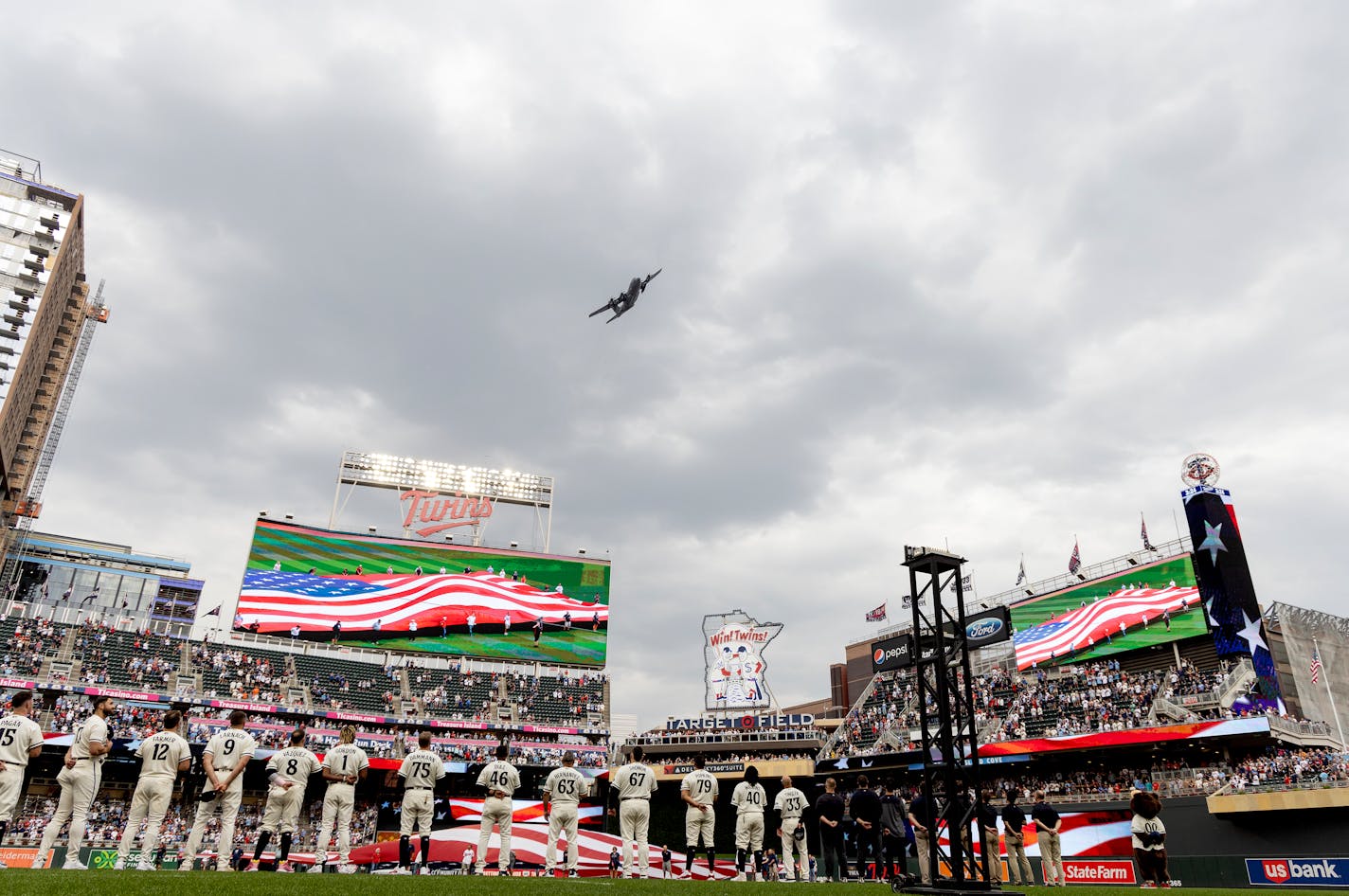 A C-130 Hercules did a flyover during the National Anthem before Game 1 of the Wild Card series, Tuesday, October 3, 2023, at Target Field in Minneapolis, Minn. ] CARLOS GONZALEZ • carlos.gonzalez@startribune.com