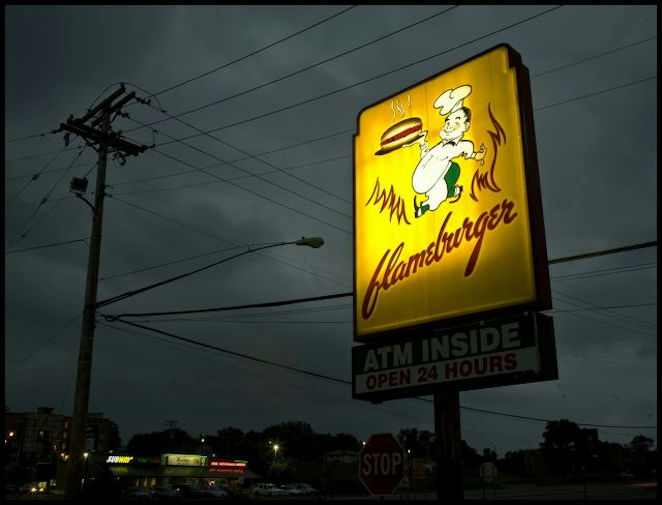 TOM WALLACE � twallace@startribune.com Assign: #00004338A slug: retrovita0904 August16/27, 2008 vita.mn cover story on the retro suburbia theme ala Coen Brothers movie shooting in the twin cities suburbs,- 70's era landmarks still around. The Flameburger.