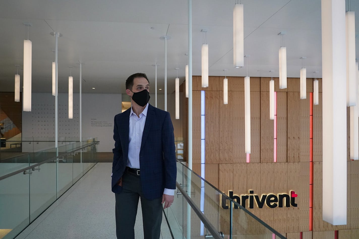 Eric Merriman, Thrivent director of real estate, stood on the skyway level above the main lobby of the new headquarters in downtown Minneapolis. ] Shari L. Gross ¥ shari.gross@startribune.com Thrivent unveiled its new $125 million headquarters building in downtown Minneapolis.