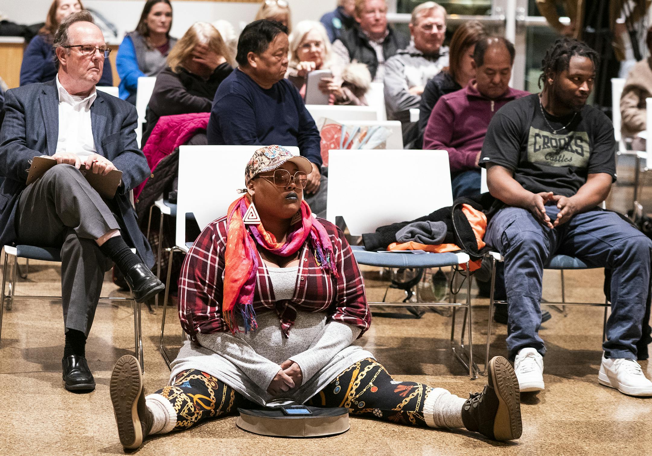 An audience member watched the St. Paul City Council Ward 6 candidate forum at Arlington Hills Community Center in St. Paul on Wednesday, Oct. 23, 2019.