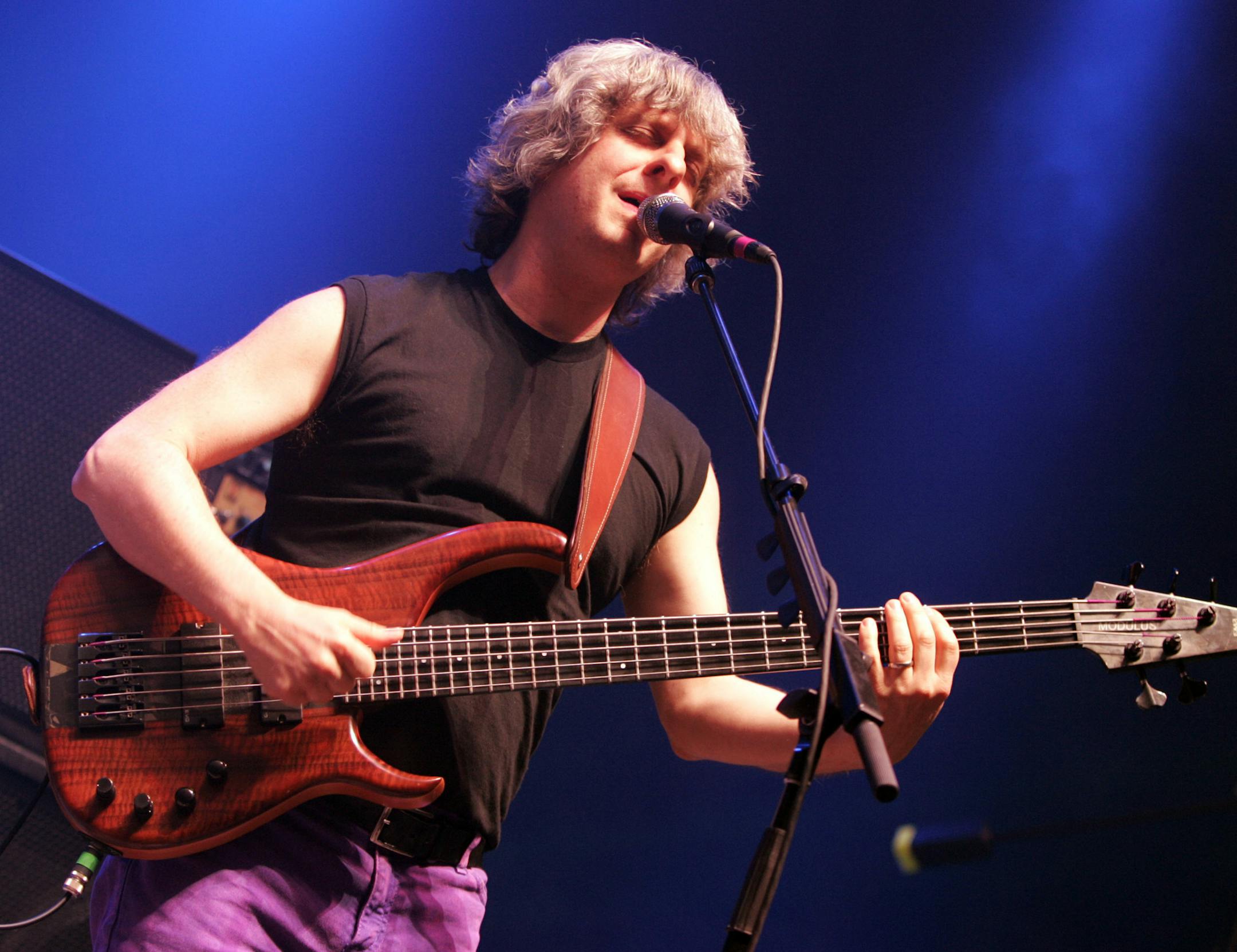 Bassist Mike Gordon of the group Phish performs for the first time in five years at the Hampton Coliseum for the first of three concerts by the reunited group in Hampton, Va., Friday, March 6, 2009. (AP Photo/Steve Helber)