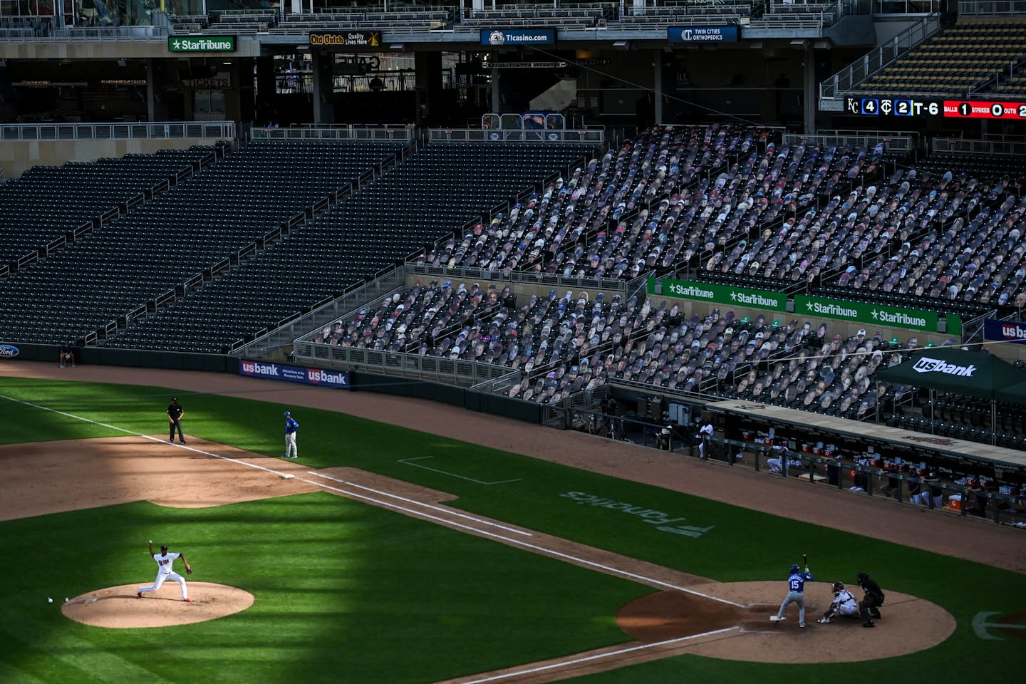 Twins pitcher Jorge Alcala threw a pitch against Kansas City second baseman Whit Merrifield in the top of the fifth inning of Saturday's second game at Target Field.