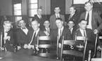 The Black Sox in court with their attorneys: (seated from left) attorney William Fallon, Jackson, Weaver, Cicotte, Risberg, Williams, Gandil. (Felsch 