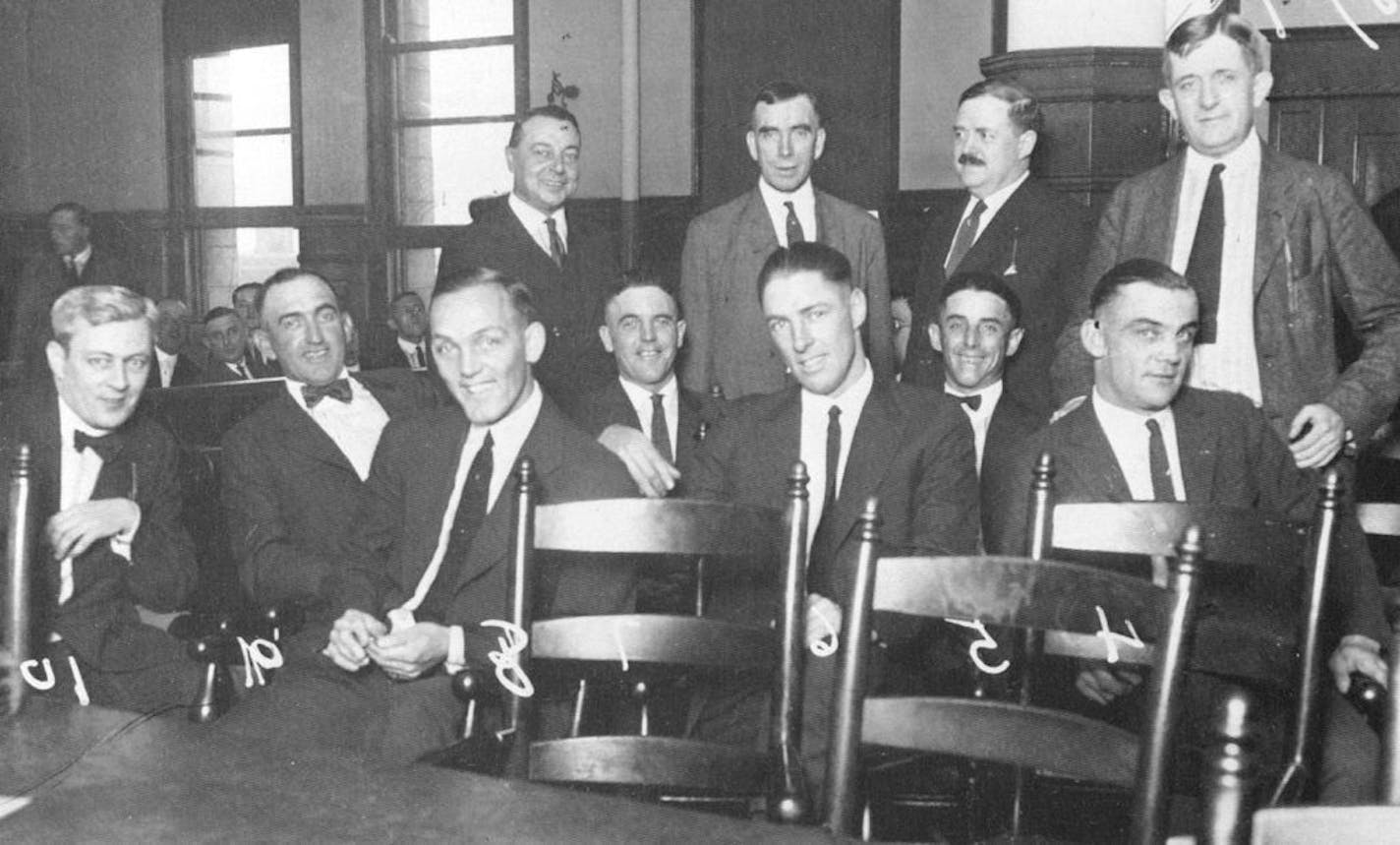 The Black Sox in court with their attorneys: (seated from left) attorney William Fallon, Jackson, Weaver, Cicotte, Risberg, Williams, Gandil. (Felsch must have stepped out, and the case against McMullin had been dropped due to insufficient evidence.)