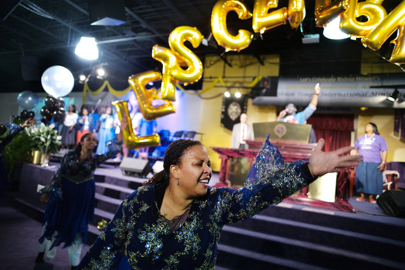 Shiloh Temple in north Minneapolis includes praise music and dance by members including Thomia Tolliver.