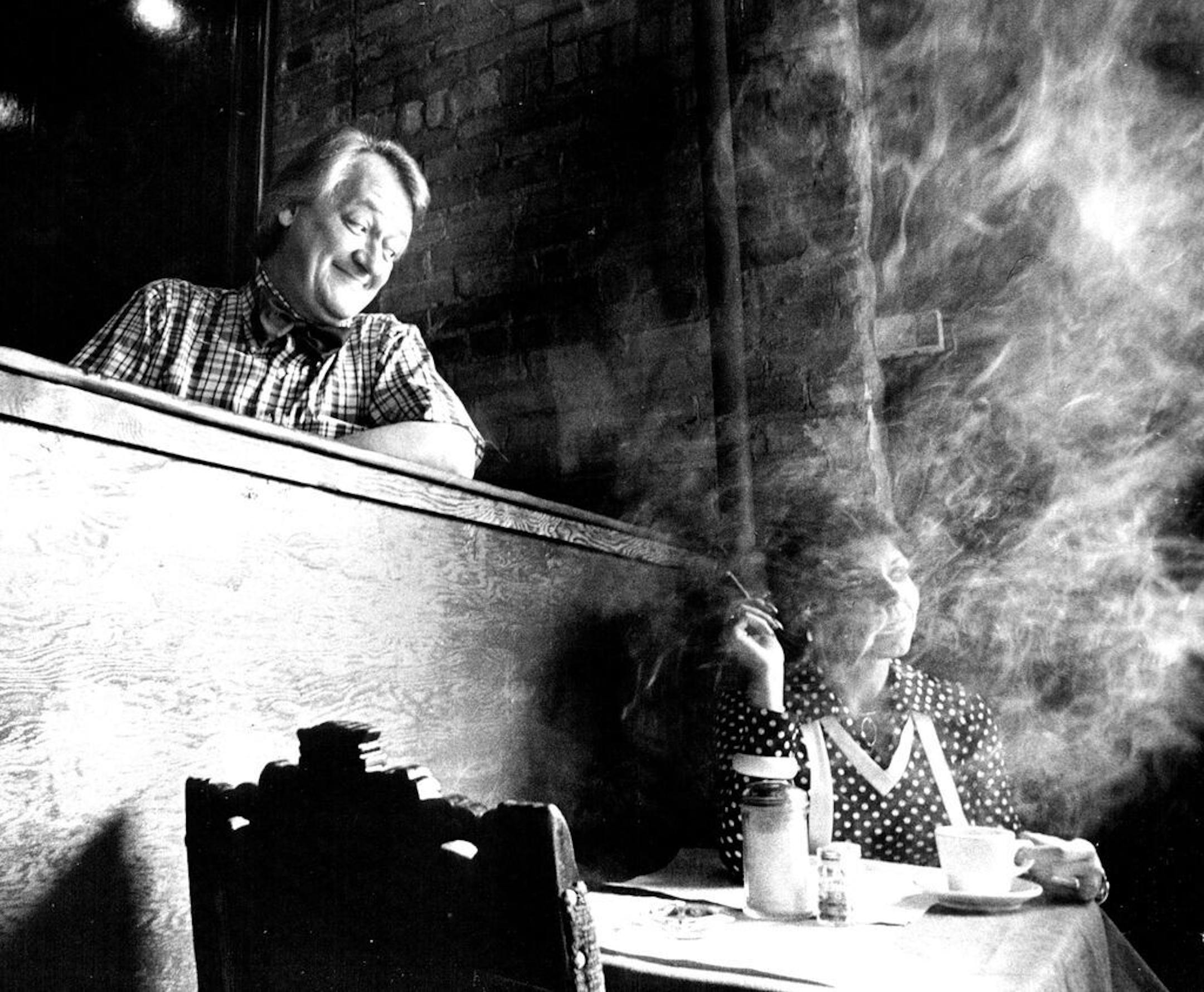 June 1976: Restaurateur Dudley Riggs leaned on the barrier that divides his cafe equally between smoking and nonsmoking sections.