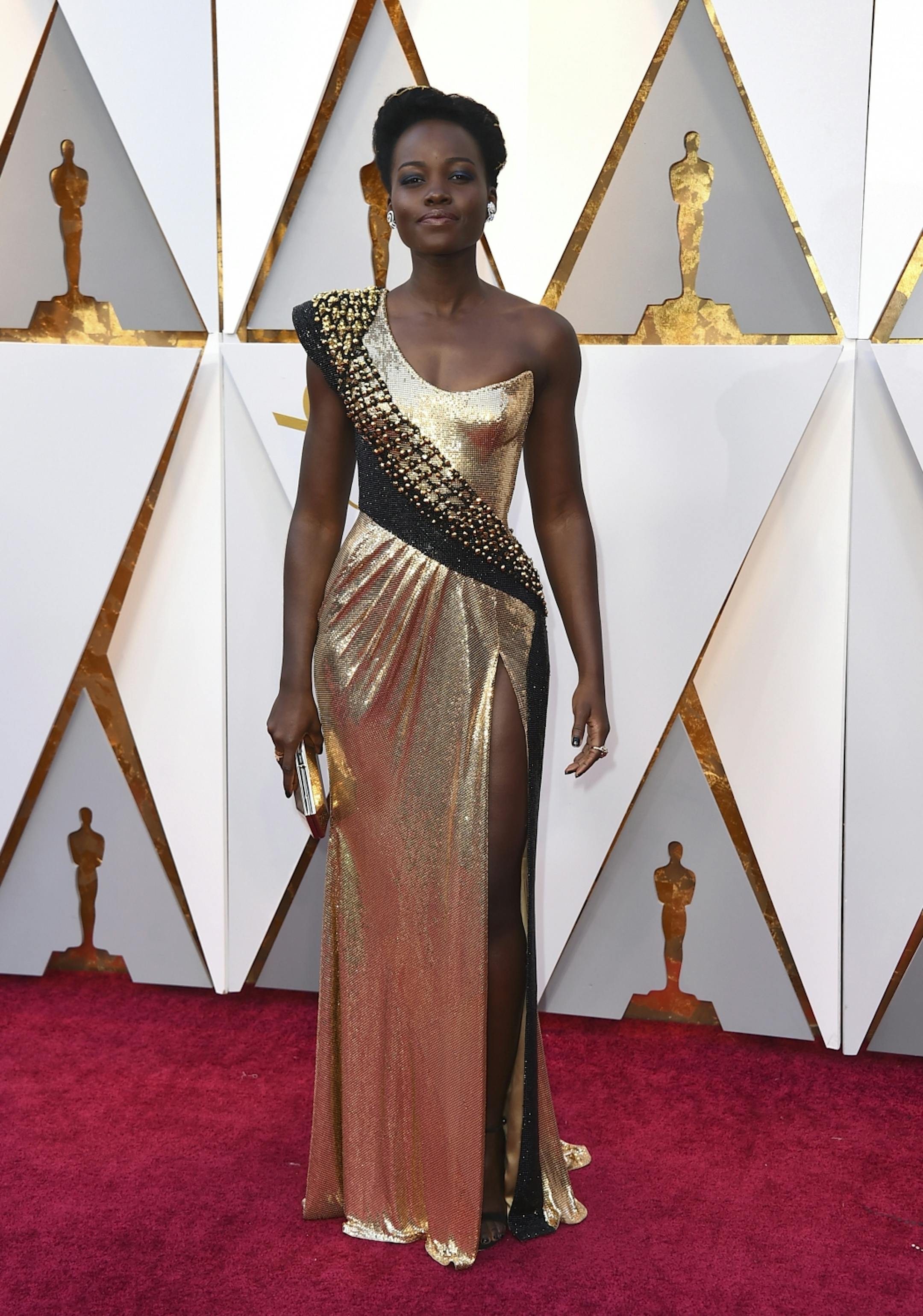 Lupita Nyong'o arrives at the Oscars on Sunday, March 4, 2018, at the Dolby Theatre in Los Angeles.