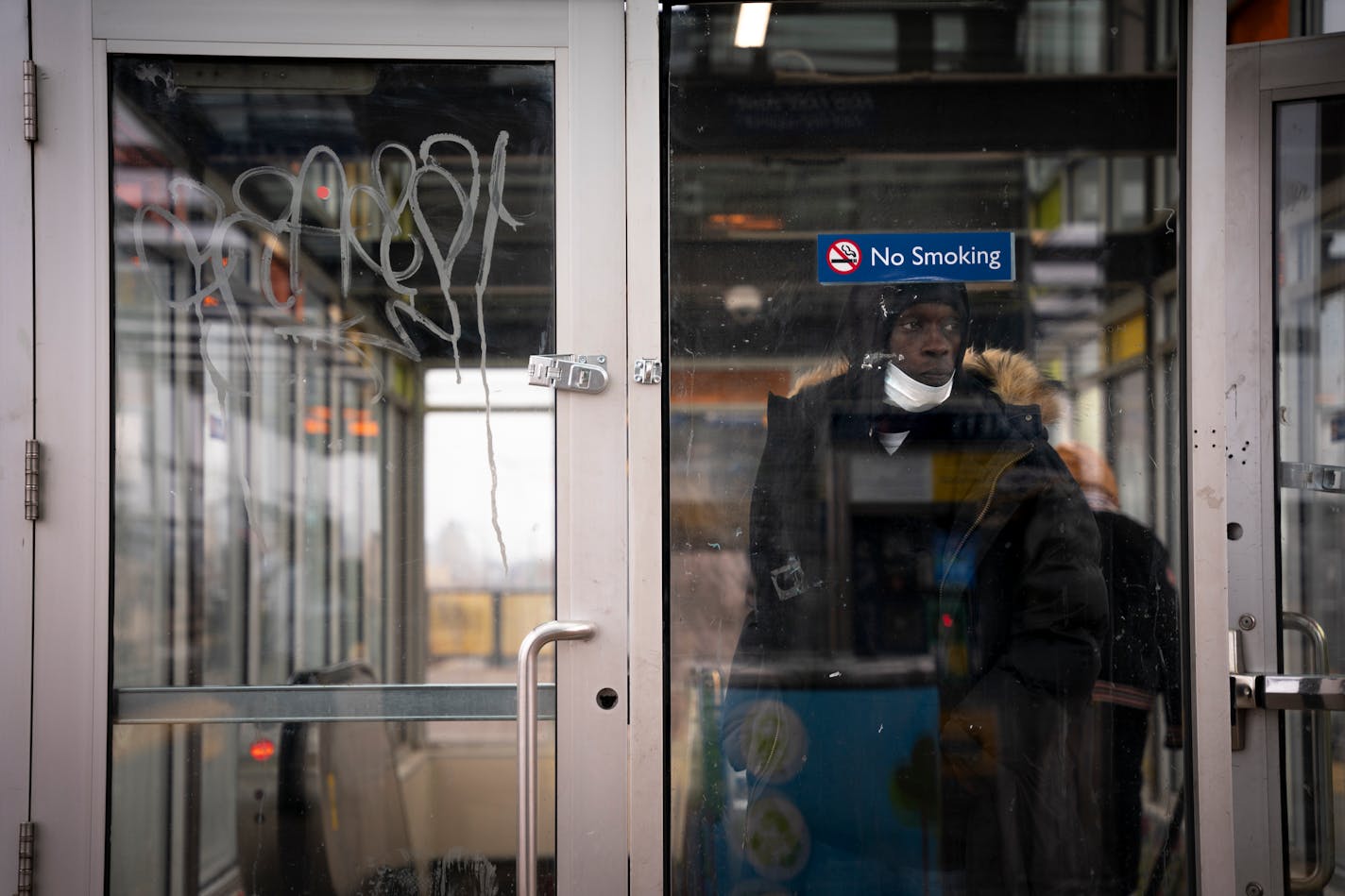 A passenger waits inside a walled room at the Lake Street Midtown light rail station on Friday, Jan. 5, 2024 in Minneapolis, Minn. The heater in the room is broken, leaving passengers to wait in the cold Minnesota weather. But this and other problems with the station will soon be fixed under a new $3.5 million renovation budget. ] Angelina Katsanis • angelina.katsanis@startribune.com