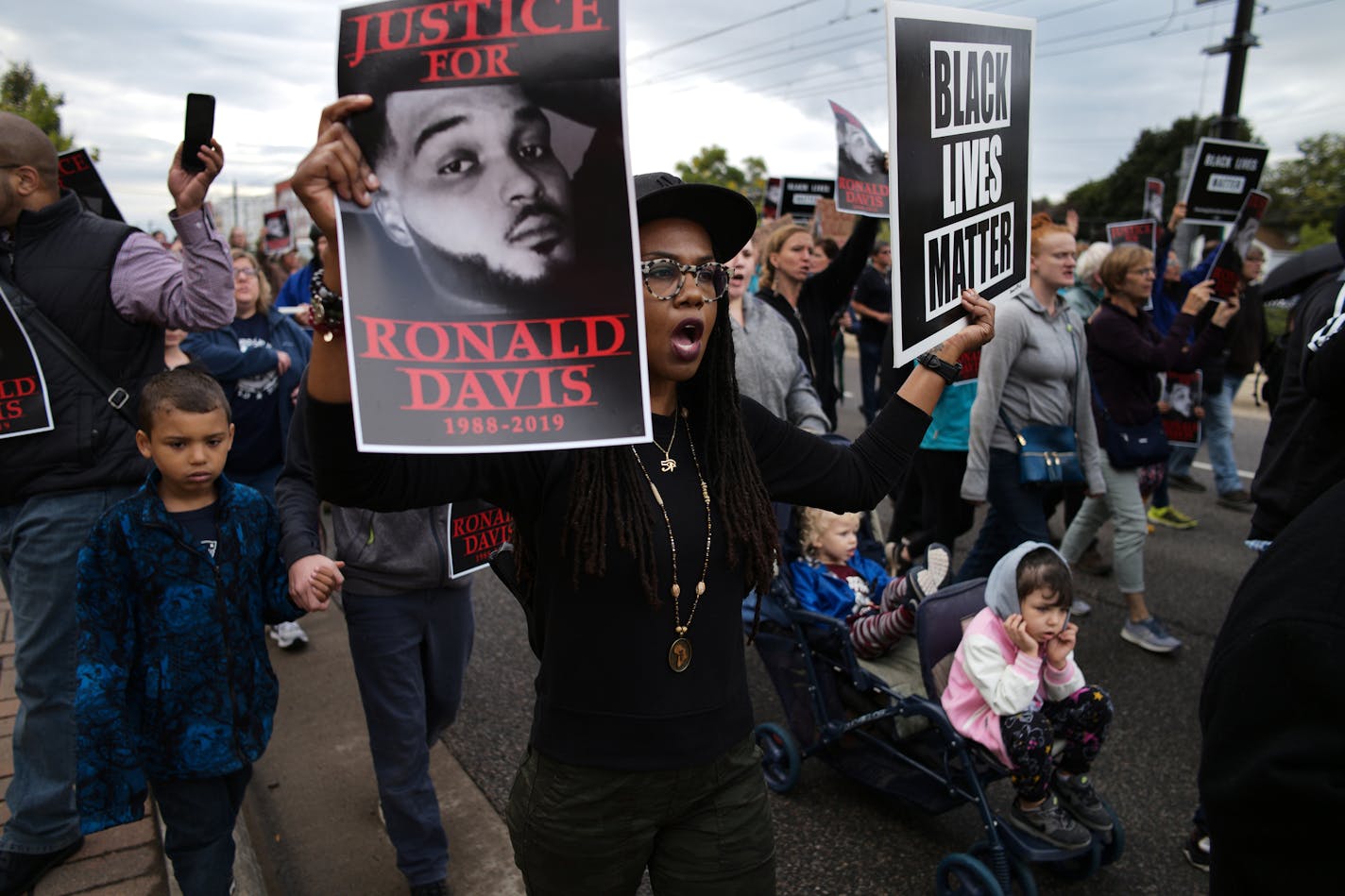 Protesters made their way from the Saint Paul Western District Headquarters to the site of Ronald Davis' death at the hands of St. Paul police on Thomas and Griggs on Sept. 15, 2019.