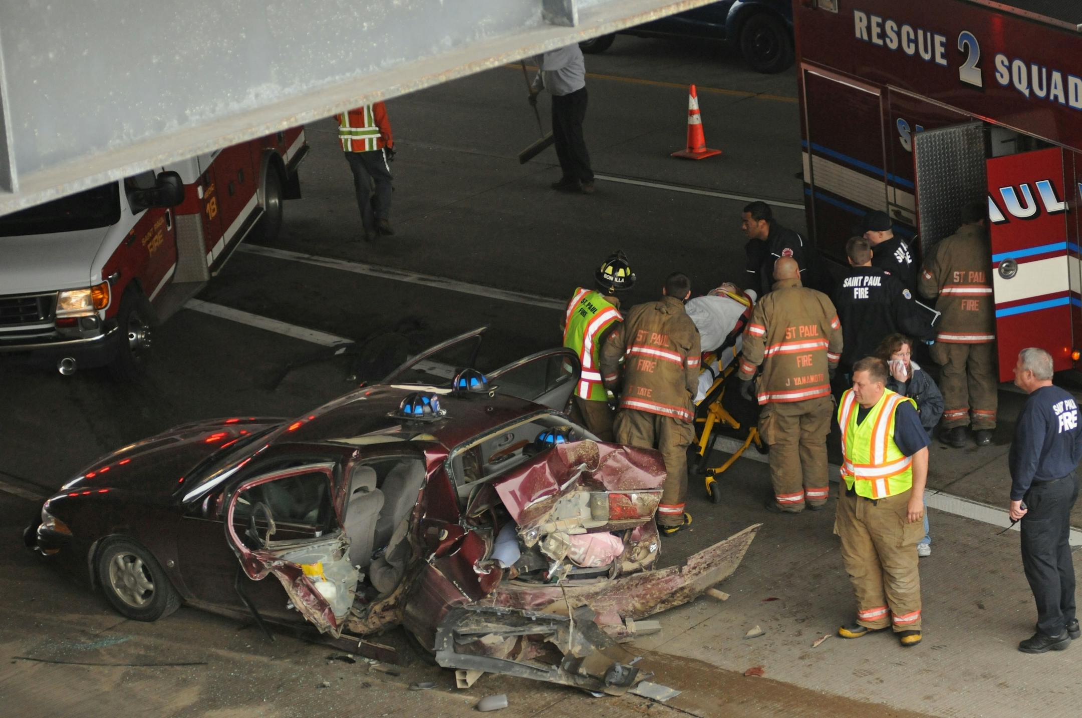 St. Paul firefighters worked to extricate a passenger from a multicar accident on eastbound Interstate 94 near the State Capitol around 12:30 p.m. Friday, April 13, 2012. Traffic on I-94 was backed up for more than a half-mile.