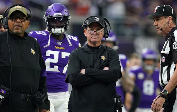 Vikings Coach Mike Zimmer will not be required to wear a mask on the sideline during games.