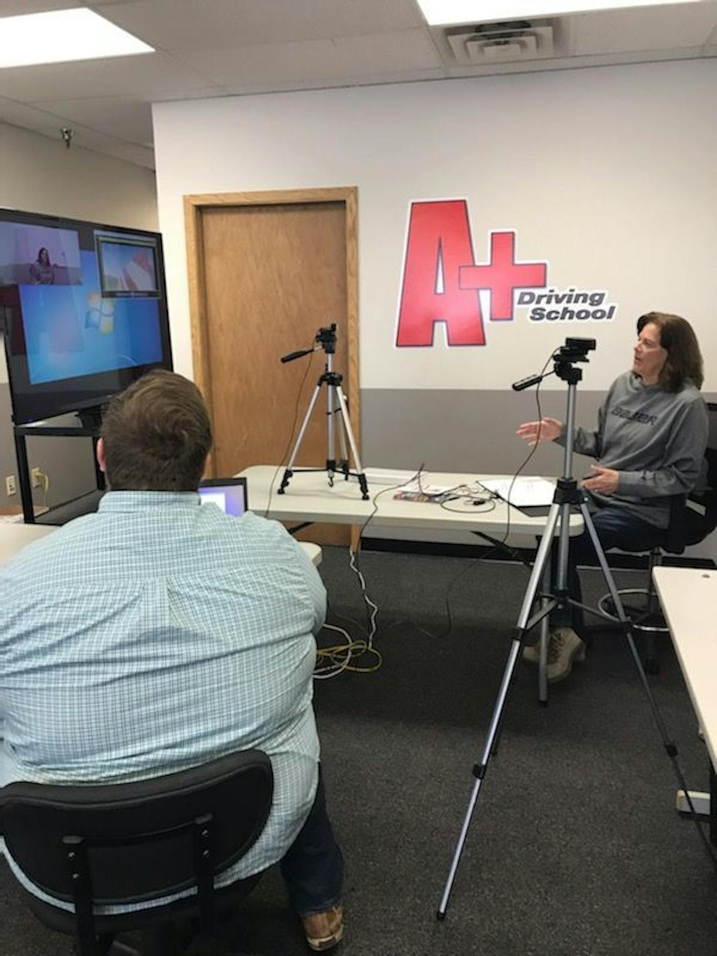 Michelle Allender and Jack Rudman of A+ Driving School in White Bear Lake conducted a driver's education class for high school students online.