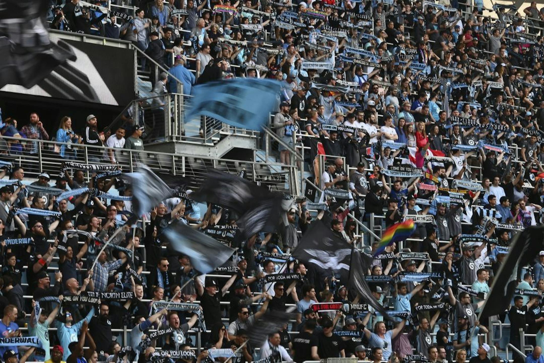 Minnesota United supporters waved their flags and held up their scarves before the start of a game last season.