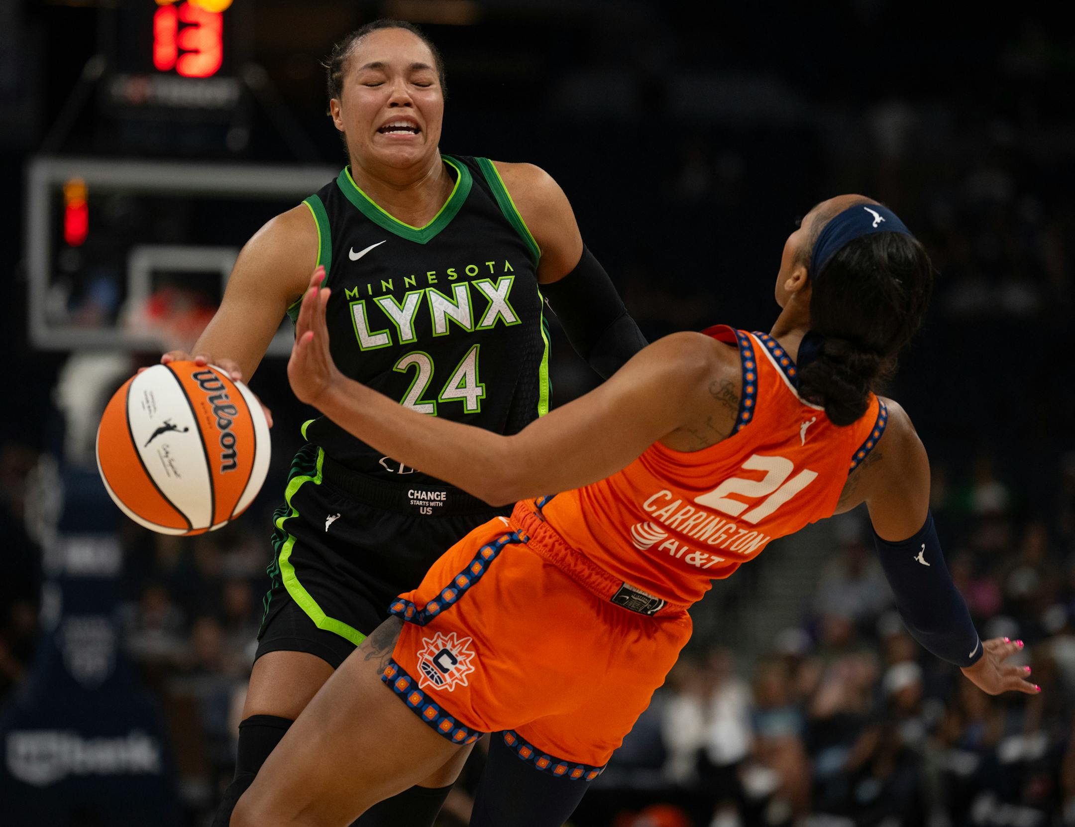 Minnesota Lynx forward Napheesa Collier (24) drove into Connecticut Sun guard DiJonai Carrington (21) in the second quarter Thursday night. The Minnesota Lynx faced the Connecticut Sun in a WNBA game Thursday night, June 22, 2023 at Target Center in Minneapolis.