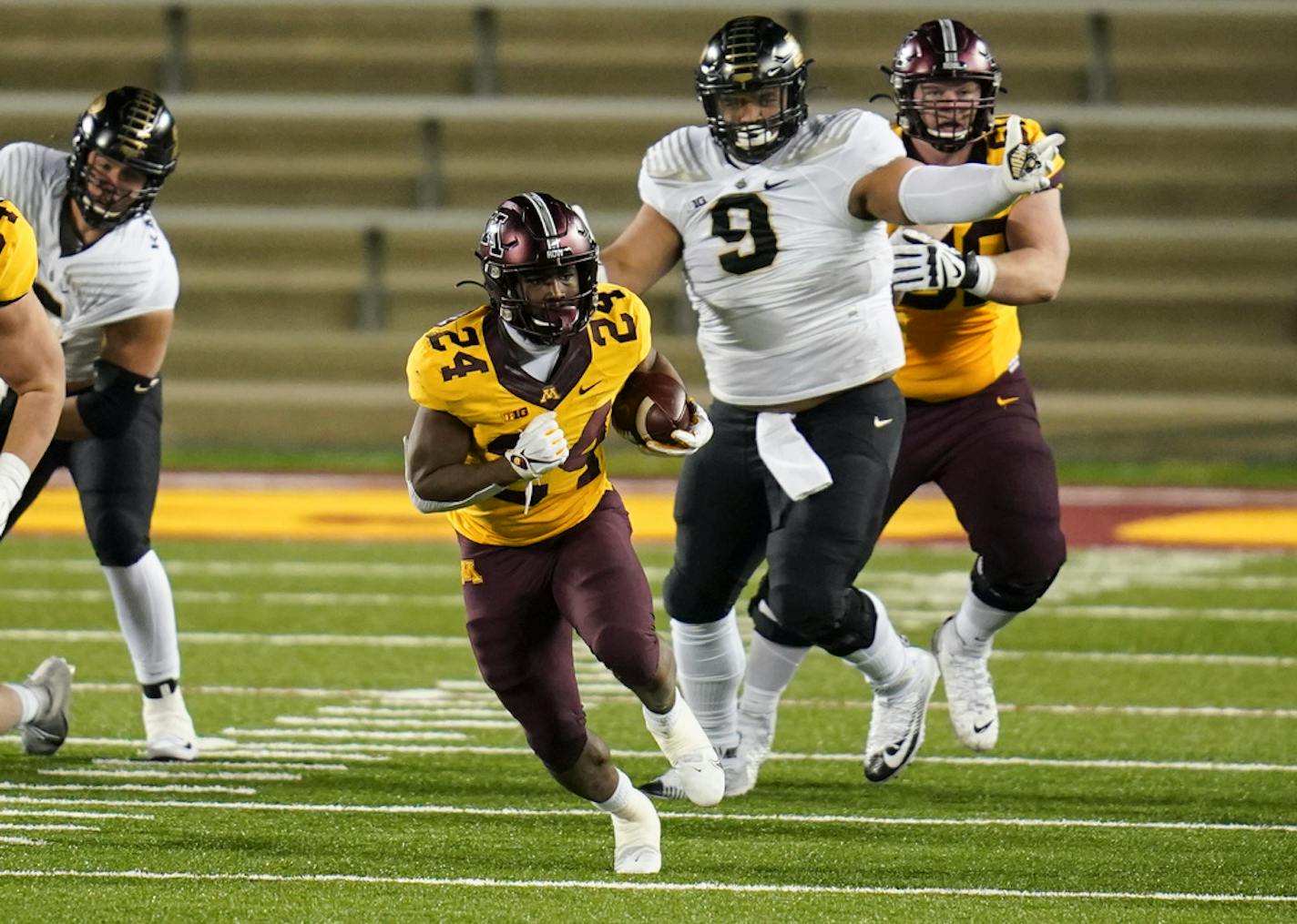 Minnesota Gophers running back Mohamed Ibrahim (24) ran with the ball in the second half. ] RENEE JONES SCHNEIDER renee.jones@startribune.com The Minnesota Gophers beat Purdue 34-31 at U.S. Bank Stadium at the University of Minnesota in Minneapolis, Minn., on Friday, November 20, 2020. ORG XMIT: MIN2011202259010384 ORG XMIT: MIN2106171858310132