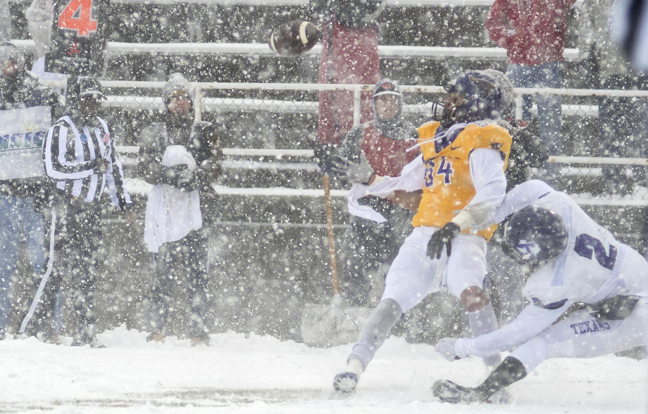 Minnesota State's Shane Zylstra makes a touchdown catch while falling down, while a Tarleton defender, Devin Hafford tried to break up the pass. Zylstra's catch capped off a 97-yard, 27-play drive for the Mavericks. Photo by Jackson Forderer
