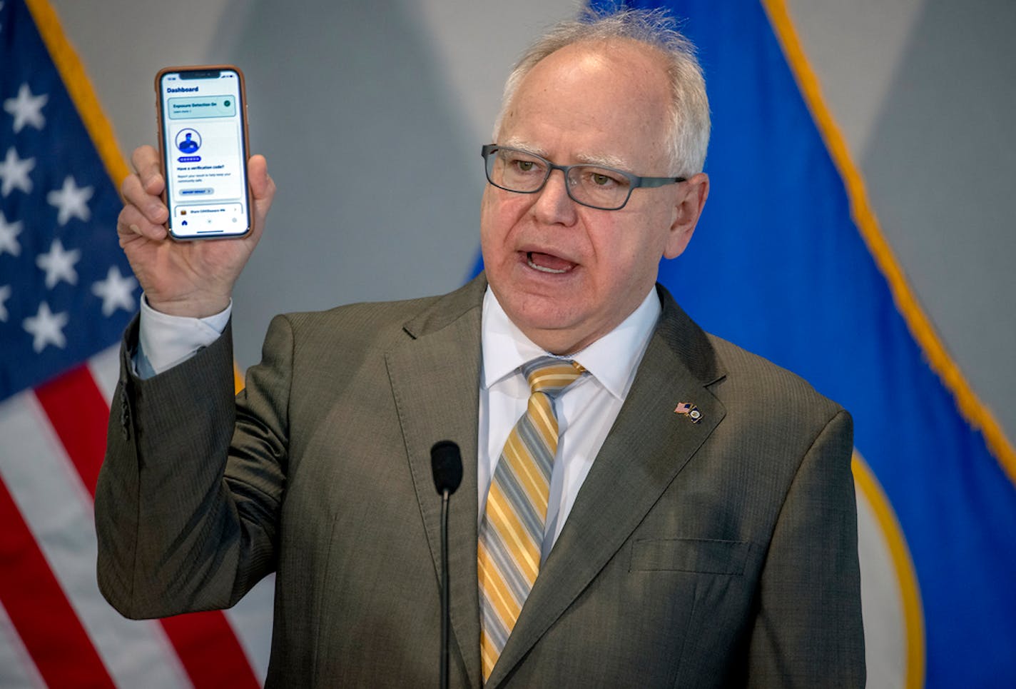 Gov. Tim Walz unveiled the COVIDawareMN mobile tracking app available to Minnesotans during a press conference Monday, Nov. 23, 2020, in St. Paul.